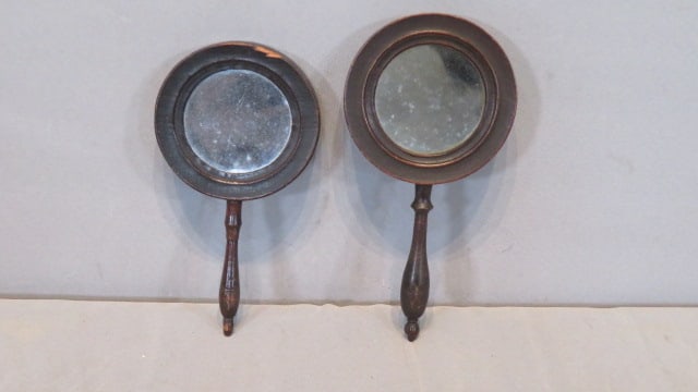 2 - 19th century wood hand mirrors: 2 - 19th century wood hand mirrors, 2-sided, old dark crackled surface, largest is 4.25"diam x 8.5"L