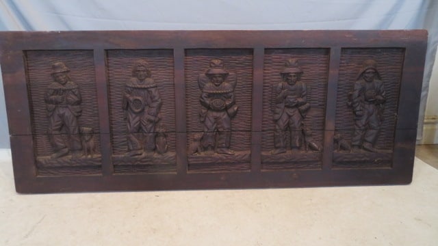 Large relief carved wood panel with Indigenous characters and dogs (1 of 7)