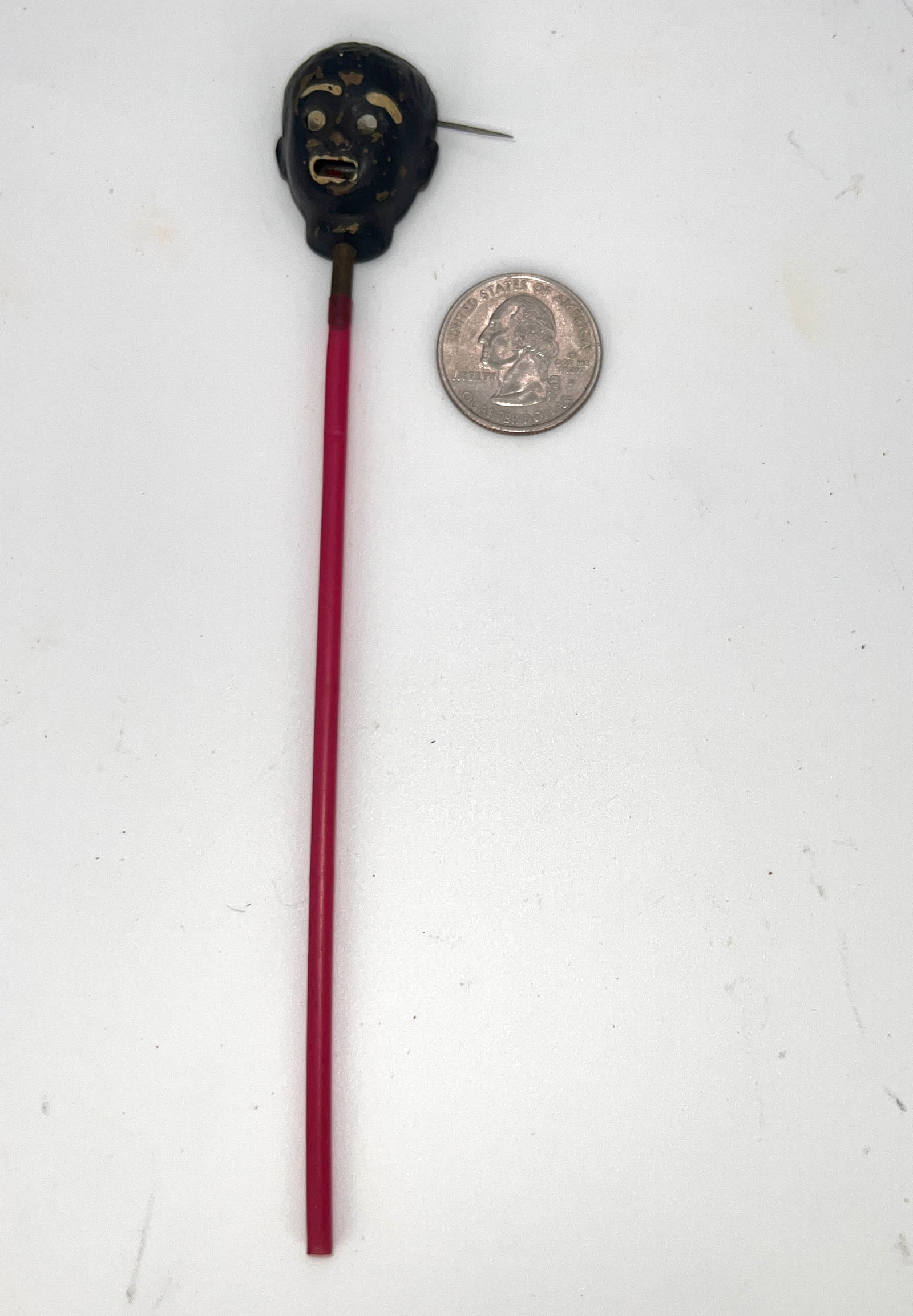 Rare Scary Embossed Tin Face Baby Head on a Straw (1 of 4)