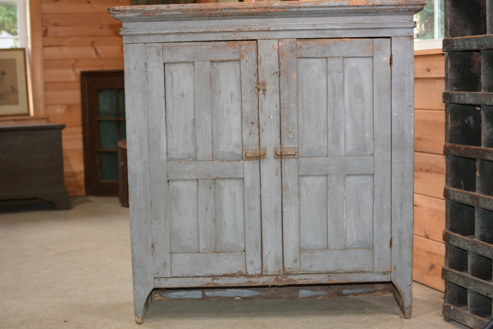 Blind Door Cupboard Top: Blind door cupboard top w/ two chamfered doors in old gray paint. Very primitive. Right door not secured. 41"W x 15"D x 43"T