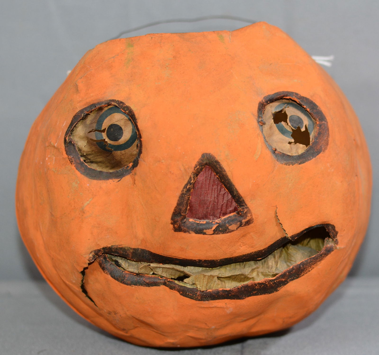 Paper pulp, early 1900, Jack O'Lantern with paper faced insert, tin candle holder, thin wire bail (1 of 6)