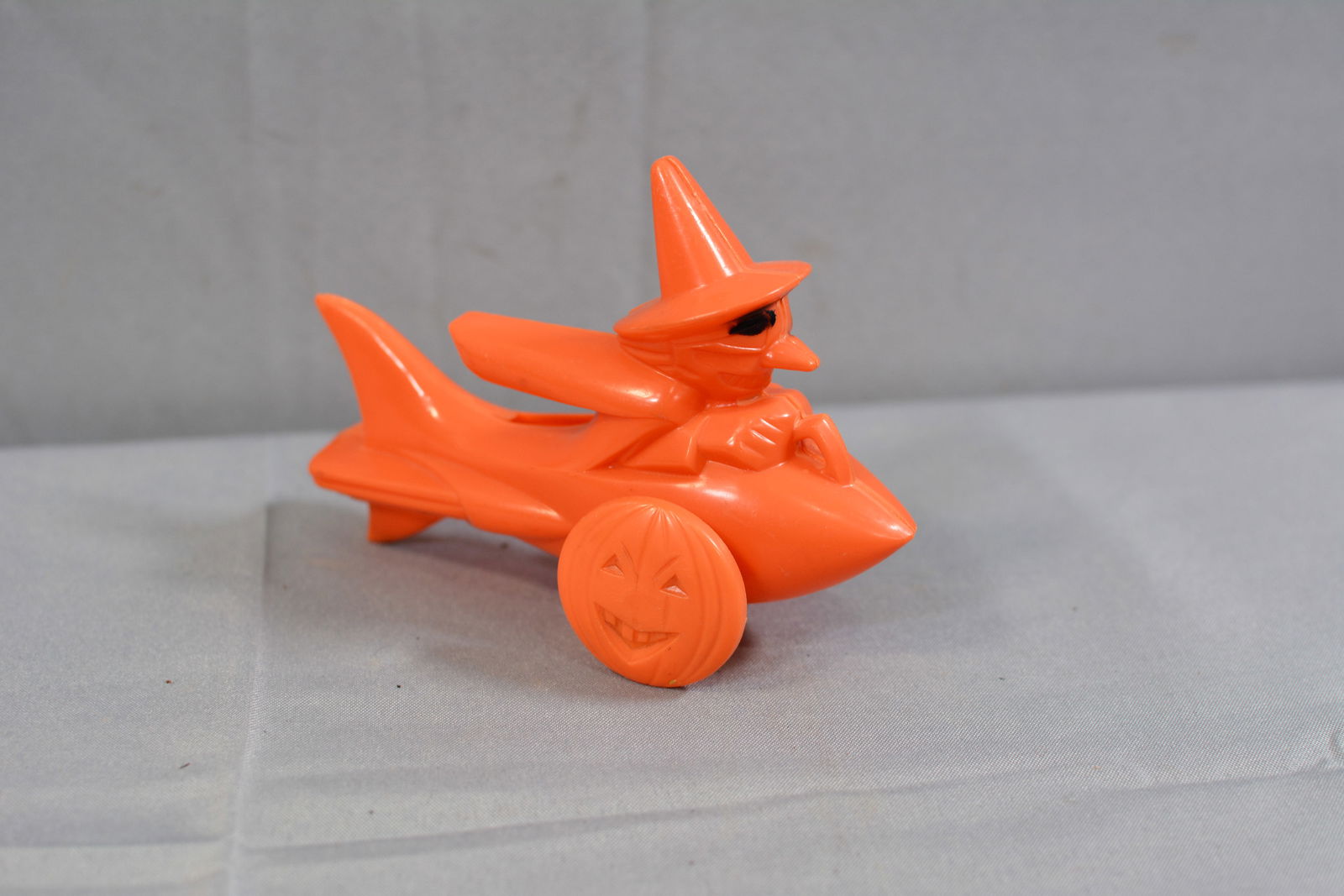 Rosbo candy container witch in rocket on jack-o-lantern wheels, 5"X%"X3" (1 of 3)