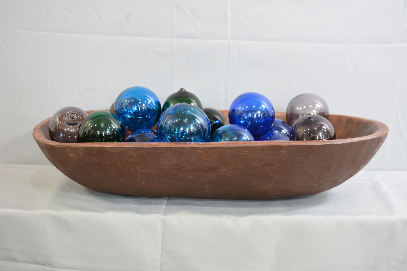 Hand Blown Glass Fish Net Floats, 15 pieces, all approx. 3" around, includes contemporary wooden: Hand Blown Glass Fish Net Floats, 15 pieces, all approx. 3" around, includes contemporary wooden bowl.