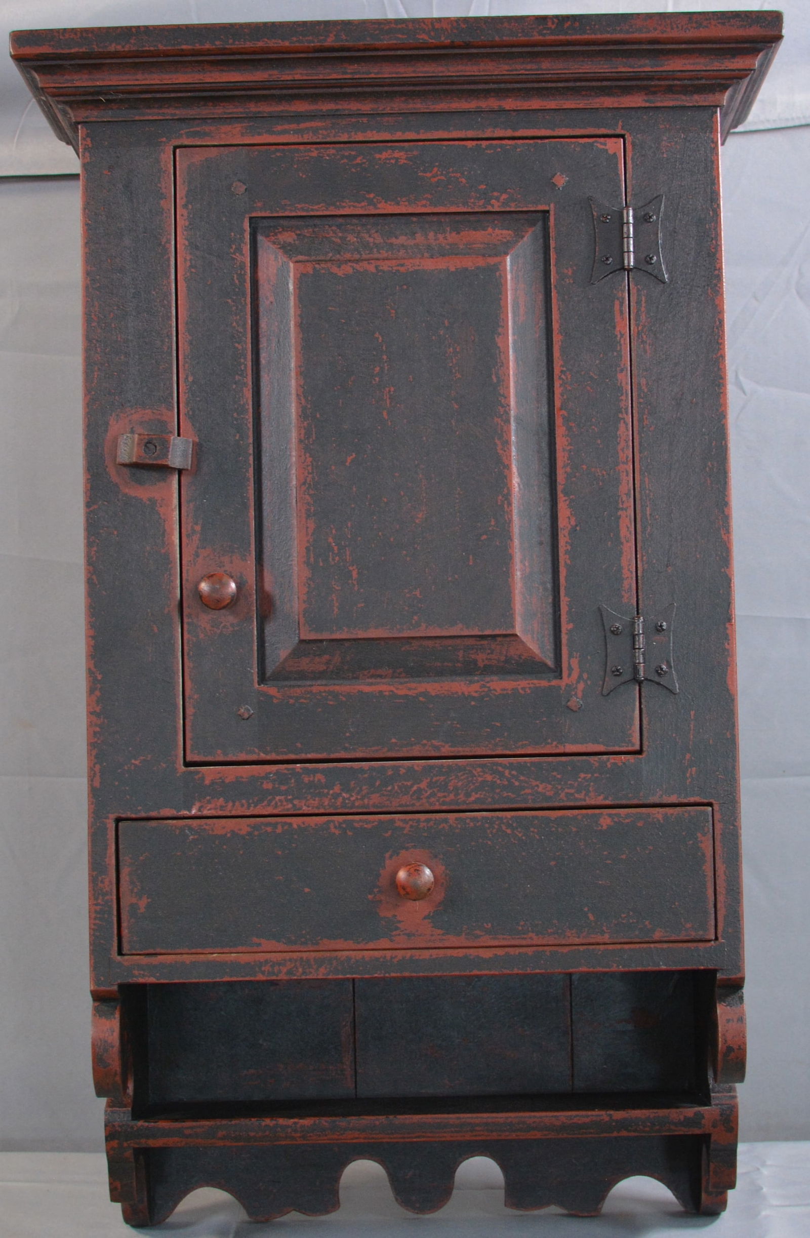 Single raised panel door over drawer hanging cupboard, bluish gray over red paint, butterfly hinges, (1 of 6)