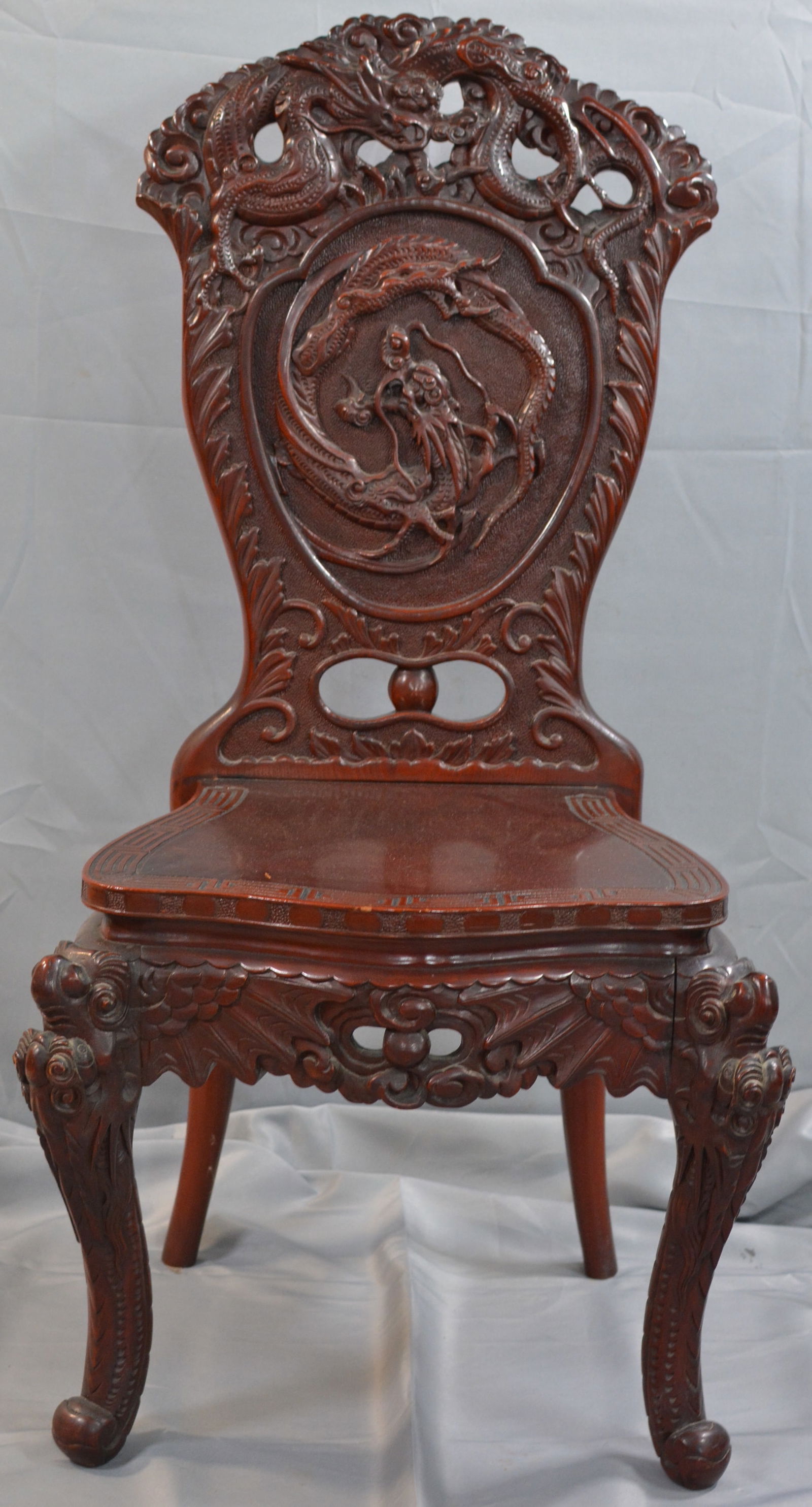 Early 1900's Japanese Carved Dragon side chair, Japanese Meiji period, elaborate carved entangled: Early 1900's Japanese Carved Dragon side chair, Japanese Meiji period, elaborate carved entangled dragons a top the back rest, relief carved dragons in shield back, and bold carved cabriole legs, this