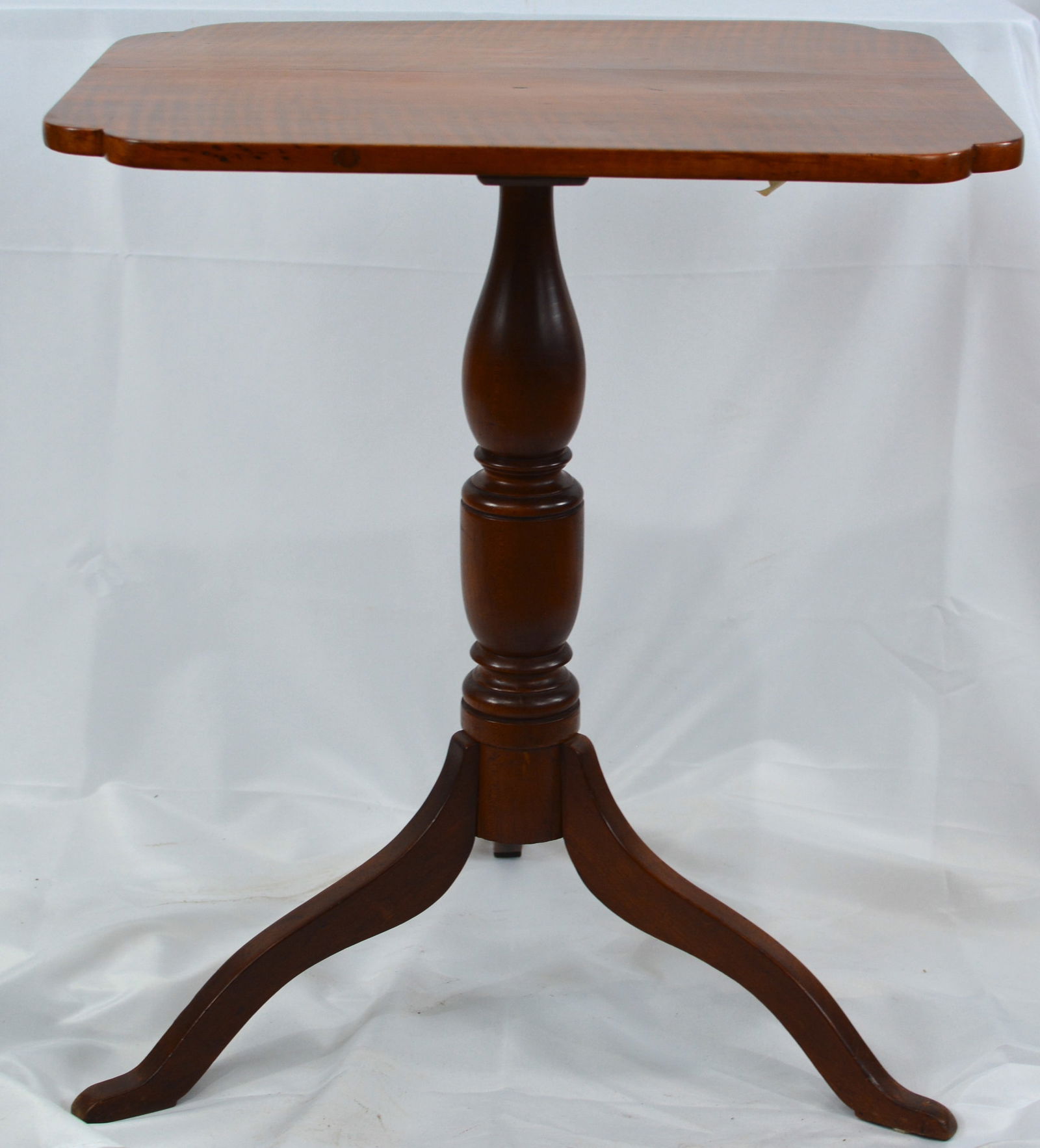 New England tiger maple top candle stand, Queen Ann Style, turned pedestal, top has a significant: New England tiger maple top candle stand, Queen Ann Style, turned pedestal, top has a significant split, 25"x28"24"