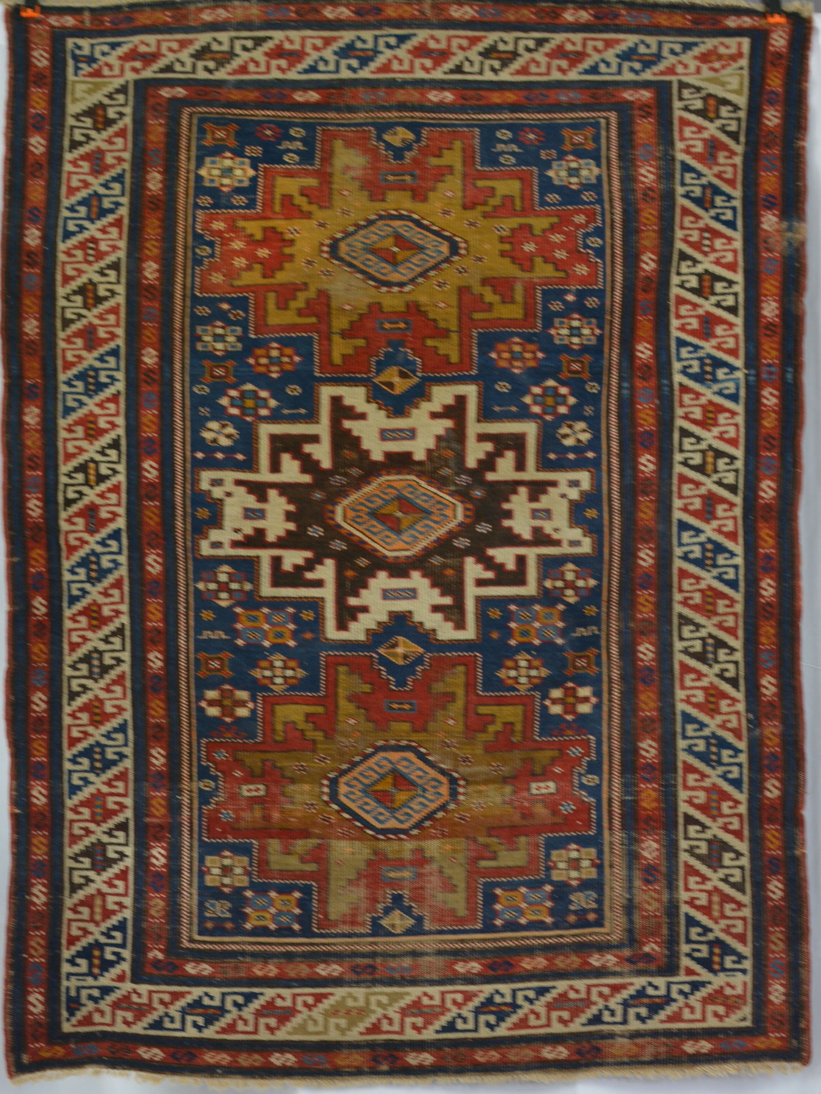 Antique Caucasian Lesghi Star Rug circa 1800's. Fringe worn, needs clean. 58"L x 43"W: Antique Caucasian Lesghi Star Rug circa 1800's. Fringe worn, needs clean. 58"L x 43"W