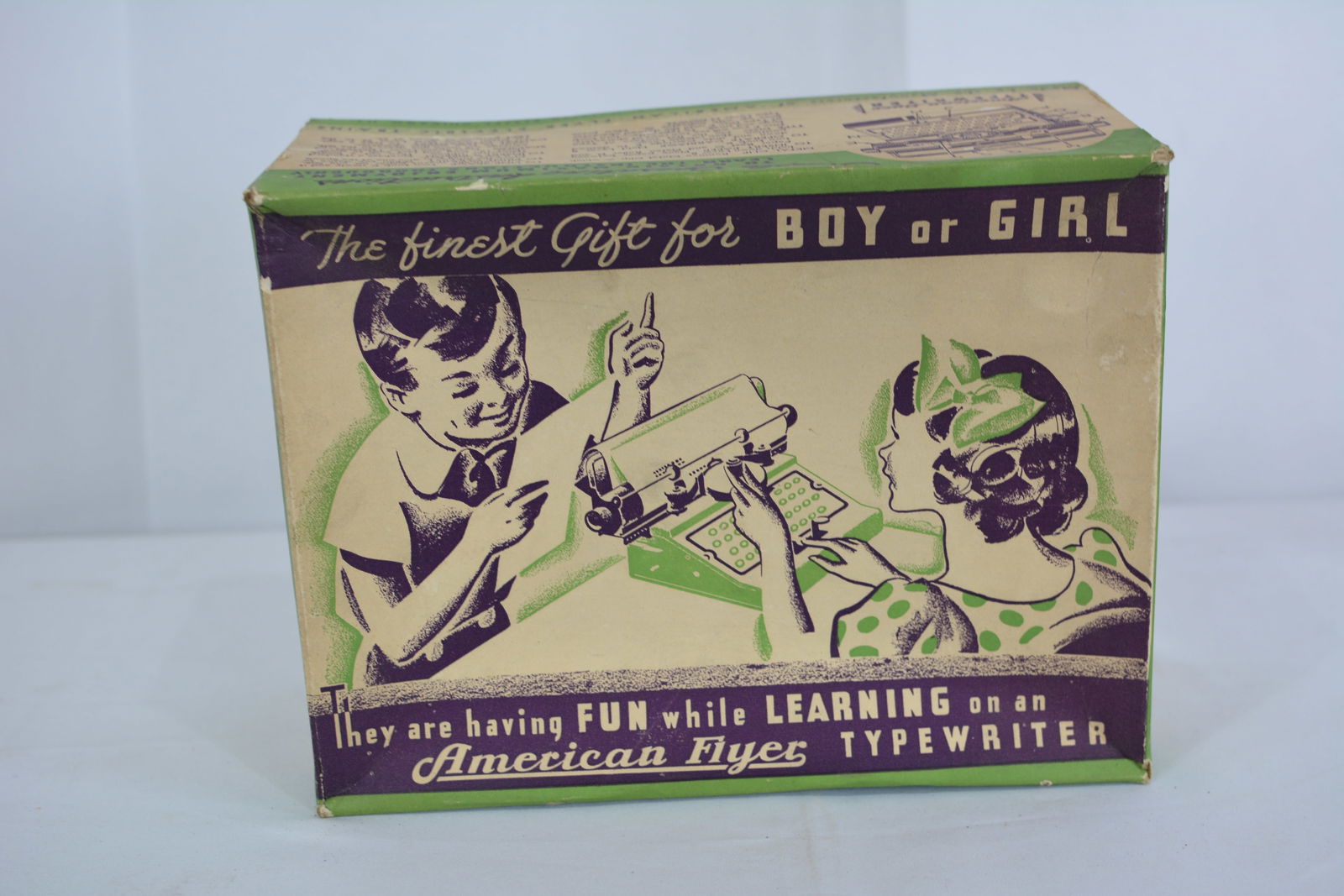 American Flyer Toy Typewriter in the original box, tin litho with the original tag and ribbon,: American Flyer Toy Typewriter in the original box, tin litho with the original tag and ribbon, 12"x10"x4"