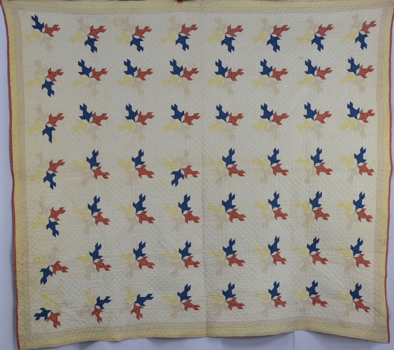Early 1900s Bird Pattern Quilt w/ yellow, tan & red border. 72"L x 66"W: Early 1900s Bird Pattern Quilt w/ yellow, tan & red border. 72"L x 66"W