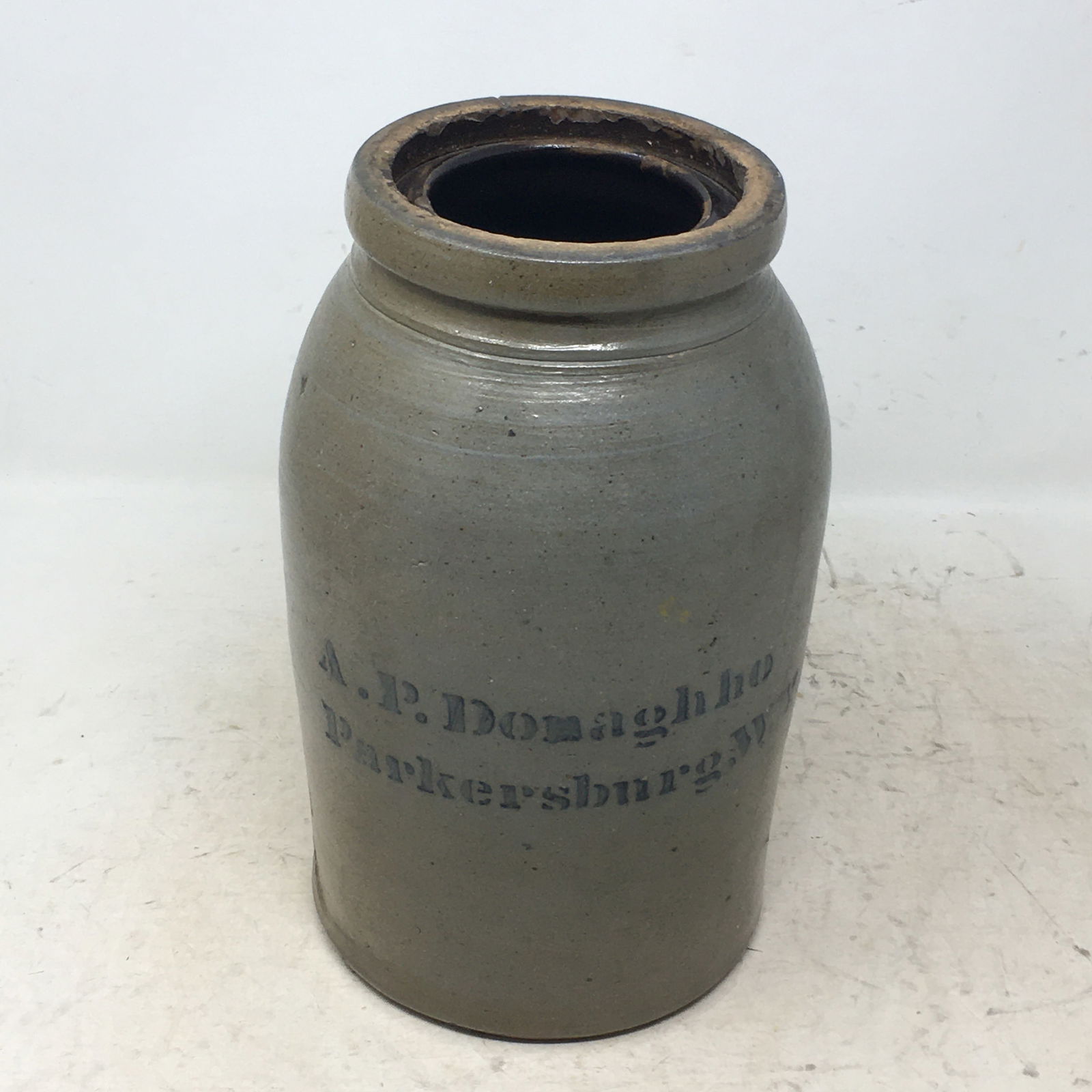A.P. Donaghho Stoneware Wax Sealer Jar. Stenciled Parkersburg W.V. Some flakes to inner rim. 10"H (1 of 4)
