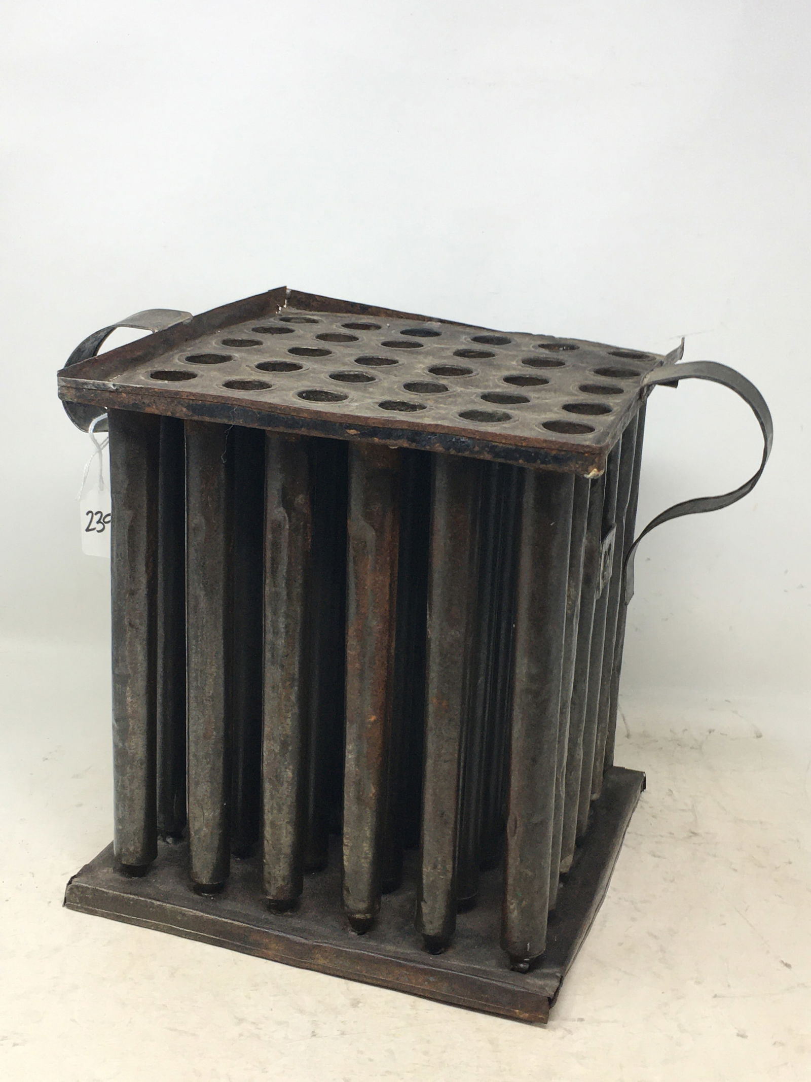 Large Tin Candle Mold, 36-candle square mold with two handles. Bottom of one handle & part of side: Large Tin Candle Mold, 36-candle square mold with two handles. Bottom of one handle & part of side panel are loose. 13"L x 9"W x 9.75"H