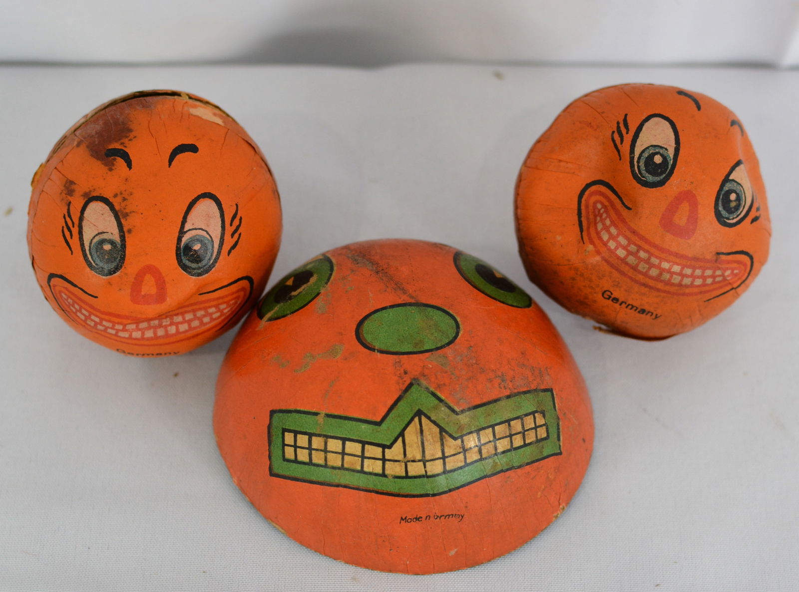 Three early paper board Jack O'Lantern face candy containers. 2 full and 1 Half. 2 1/2" Dia (1 of 7)