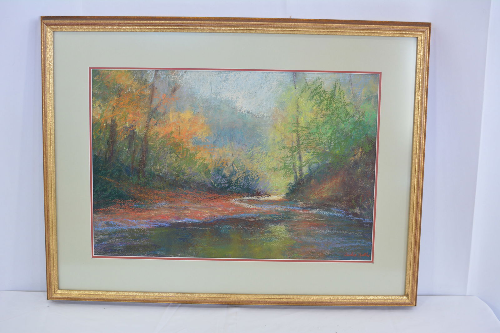 Pastel impressionist painting of Indiana landscape "Kaleidoscope of Pine Creek" dated 1998 signed by: Pastel impressionist painting of Indiana landscape "Kaleidoscope of Pine Creek" dated 1998 signed by Judie Huth. 14"T x 21"W