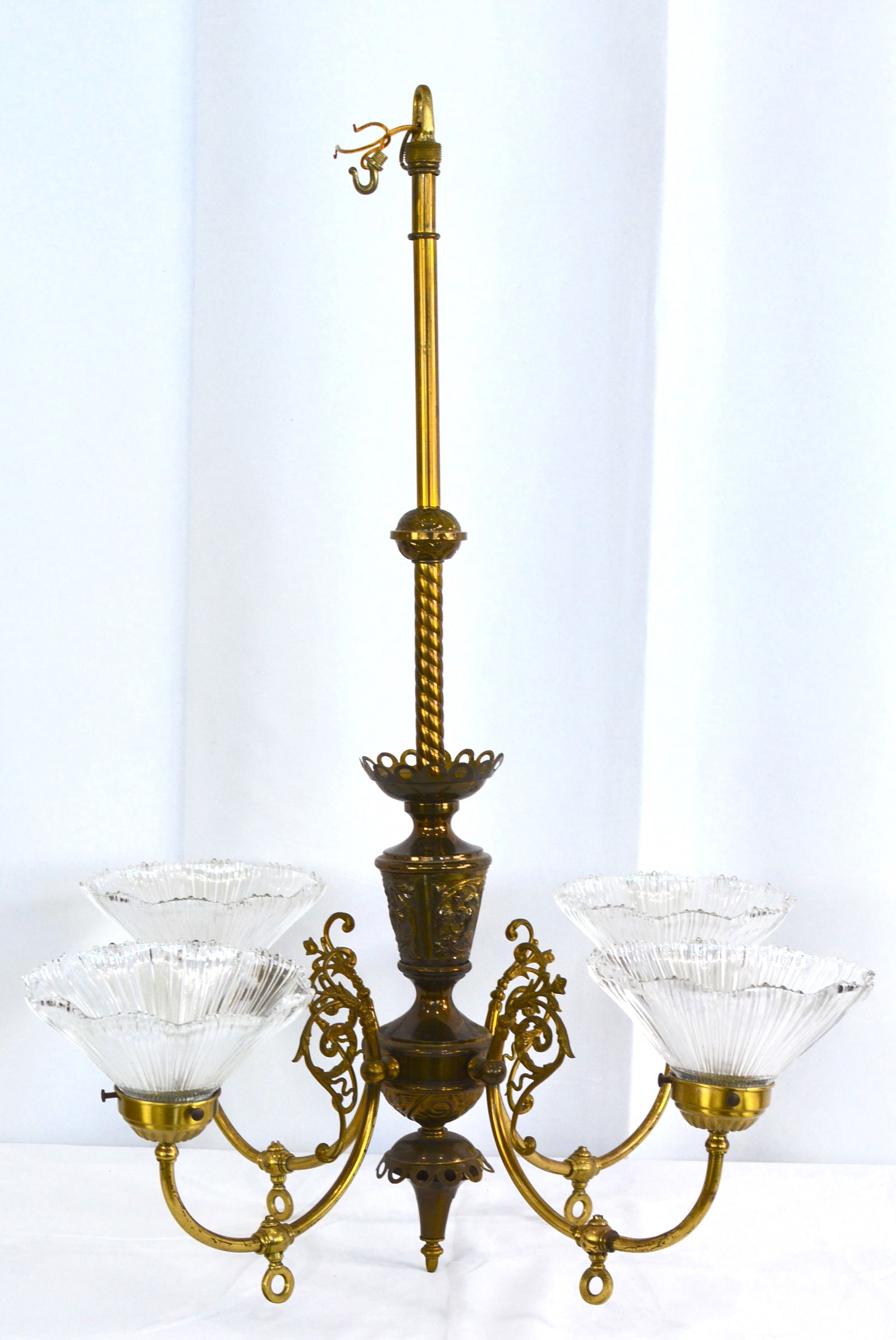 Early 1900 converted brass 4 light chandelier w/ clear glass shades. 23"T x 17"W (1 of 5)