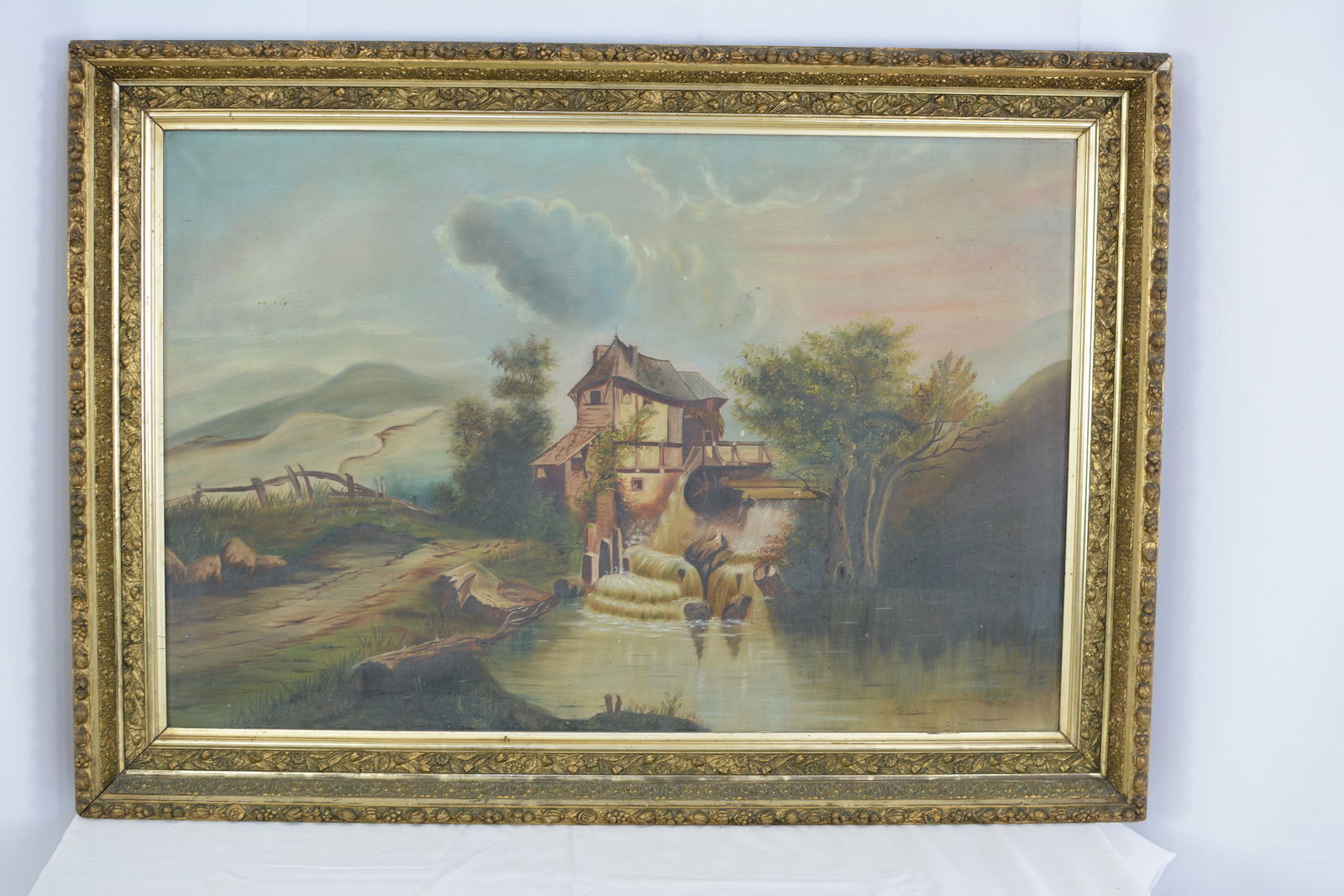Oil on canvas landscape painting of mill house by waterfall in gilded stretcher frame. 32"W x 24"T: Oil on canvas landscape painting of mill house by waterfall in gilded stretcher frame. 32"W x 24"T
