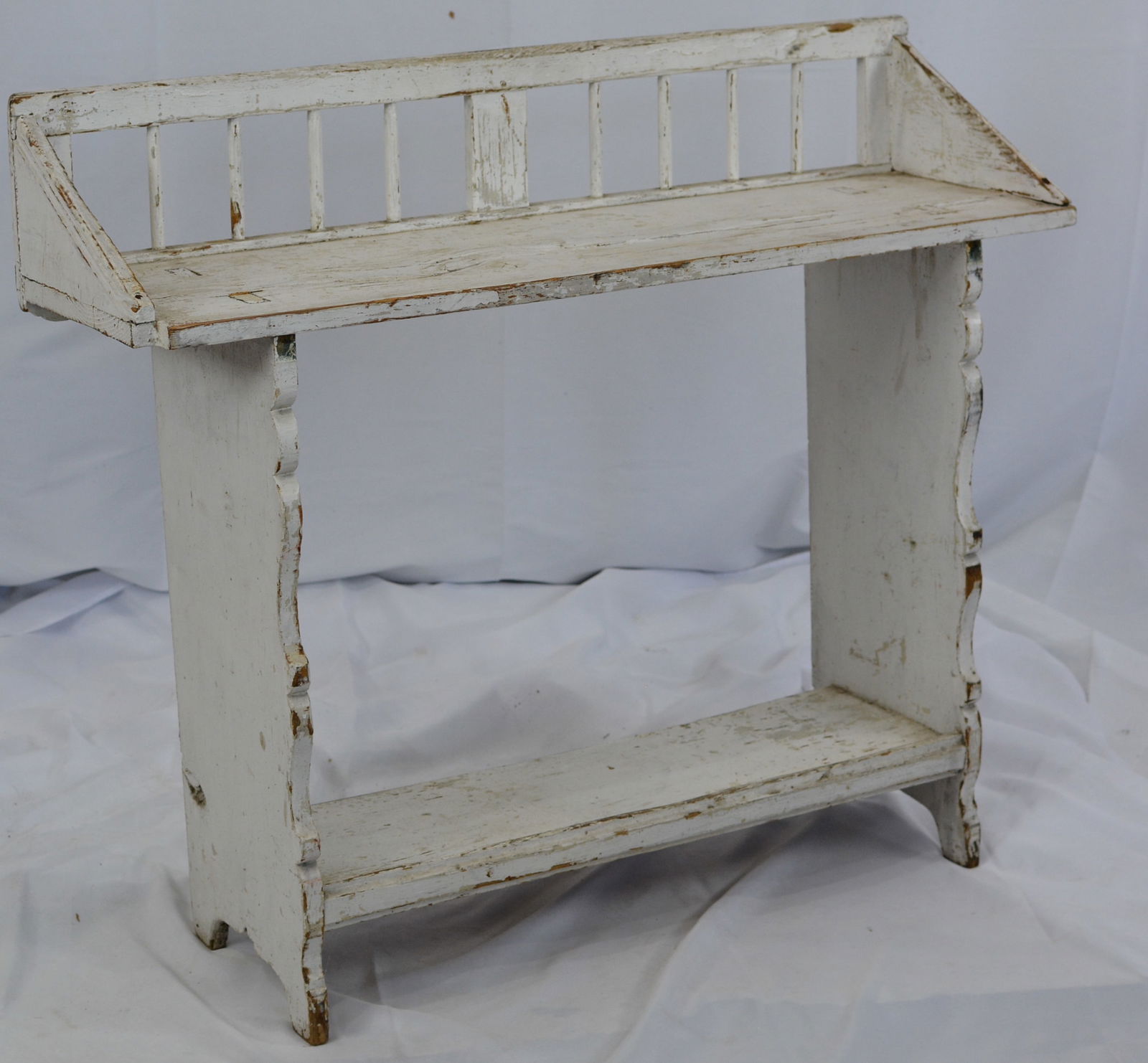 Primitive white mortised plant stand w/scalloped edge risers. 36"W x 38"T x 10"D: Primitive white mortised plant stand w/scalloped edge risers. 36"W x 38"T x 10"D