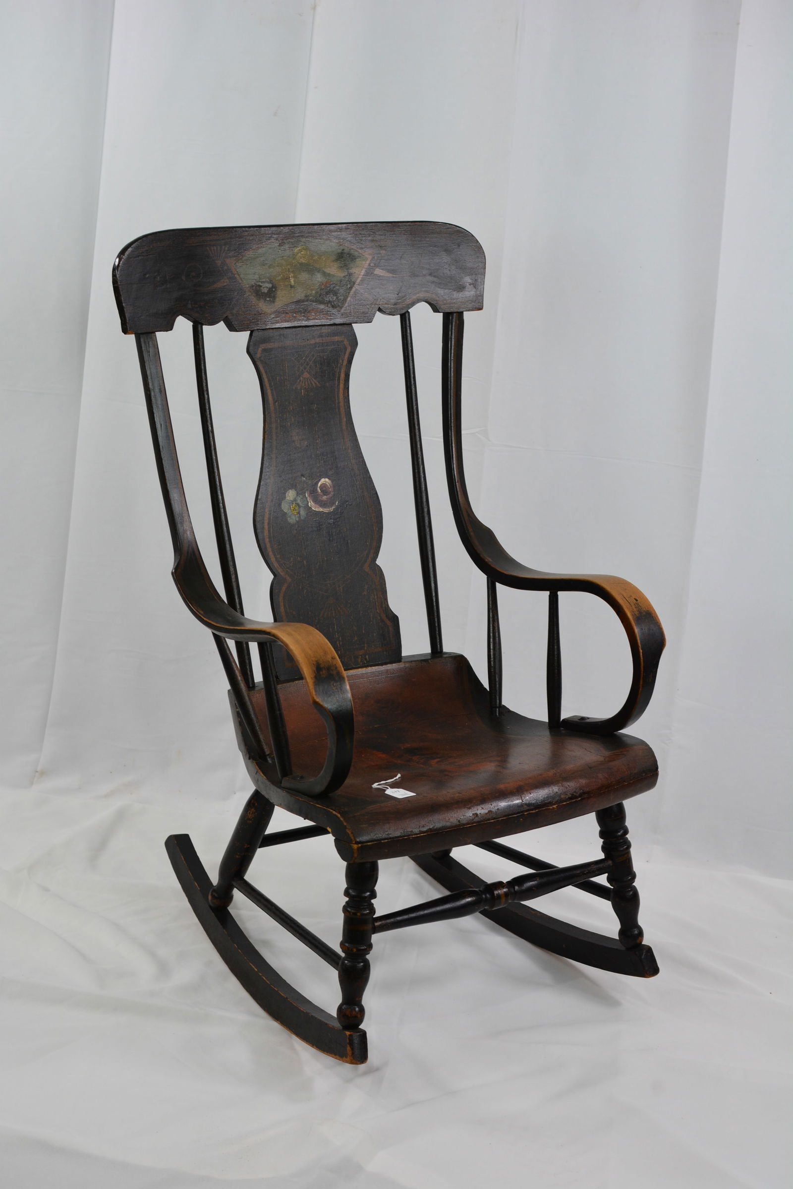 Stenciled back bent arm rocker, nice wear.: Stenciled back bent arm rocker, nice wear.