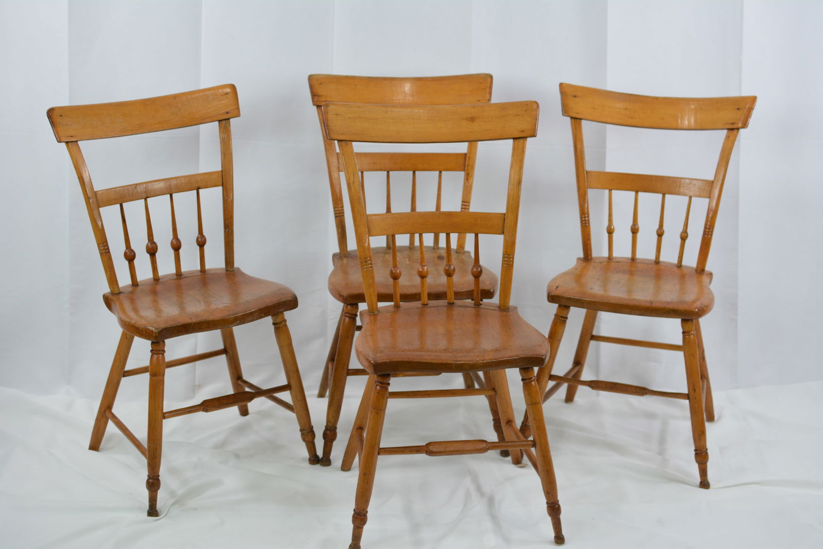 4 early American maple side chairs w/ stick & ball back.: 4 early American maple side chairs w/ stick & ball back.