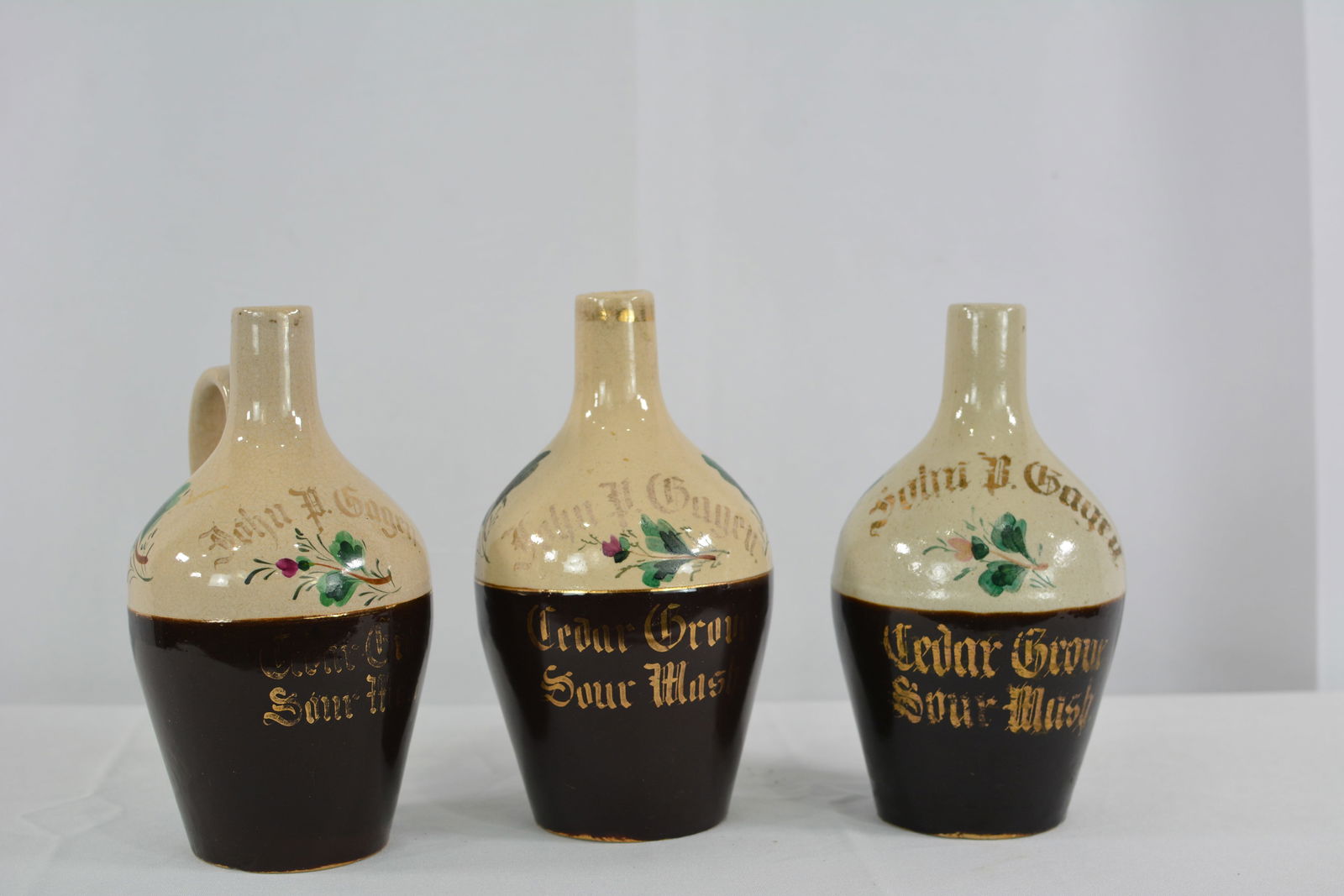 Three Gagen Stoneware Jugs "John P. Gagen Cedar Grove Sour Mash".: Three Gagen Stoneware Jugs "John P. Gagen Cedar Grove Sour Mash".