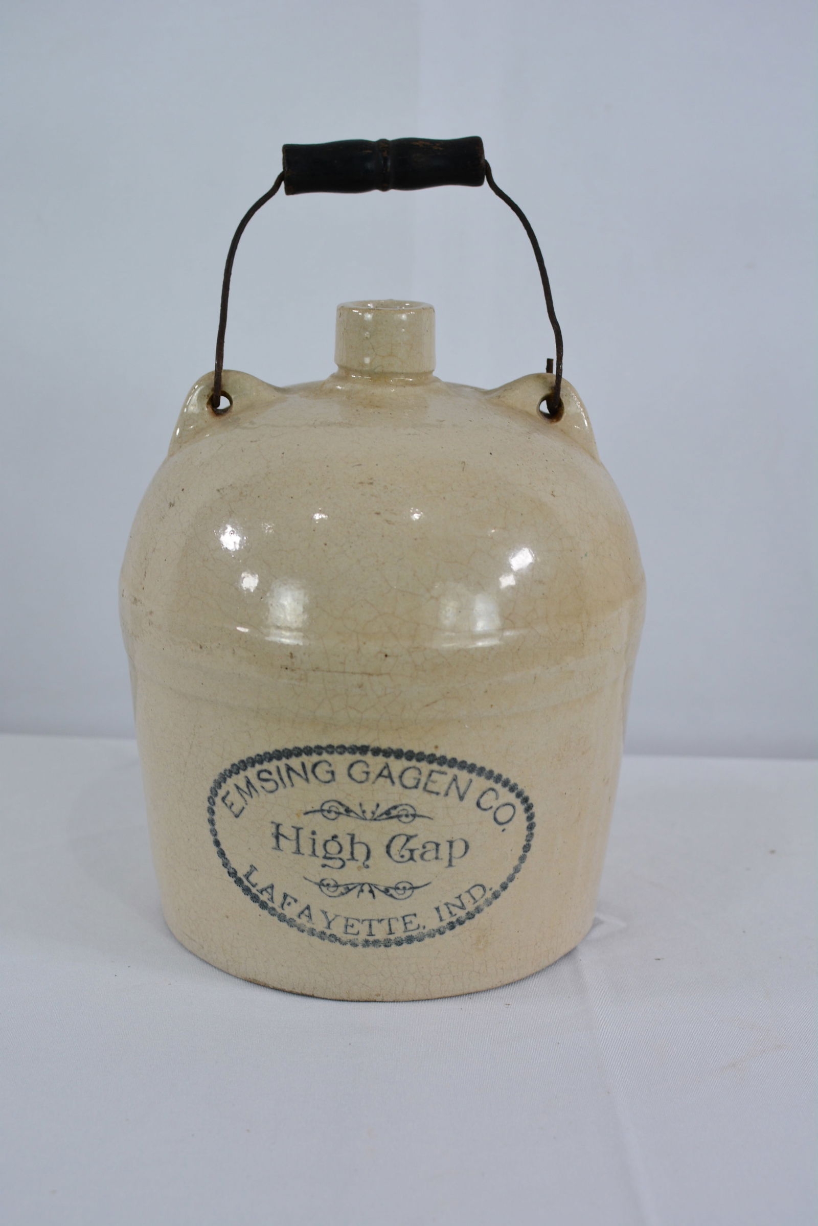 Lafayette Indiana Emsing Gagen Co. High Gap stoneware jug w/wire bail & wood handle.: Lafayette Indiana Emsing Gagen Co. High Gap stoneware jug w/wire bail & wood handle.