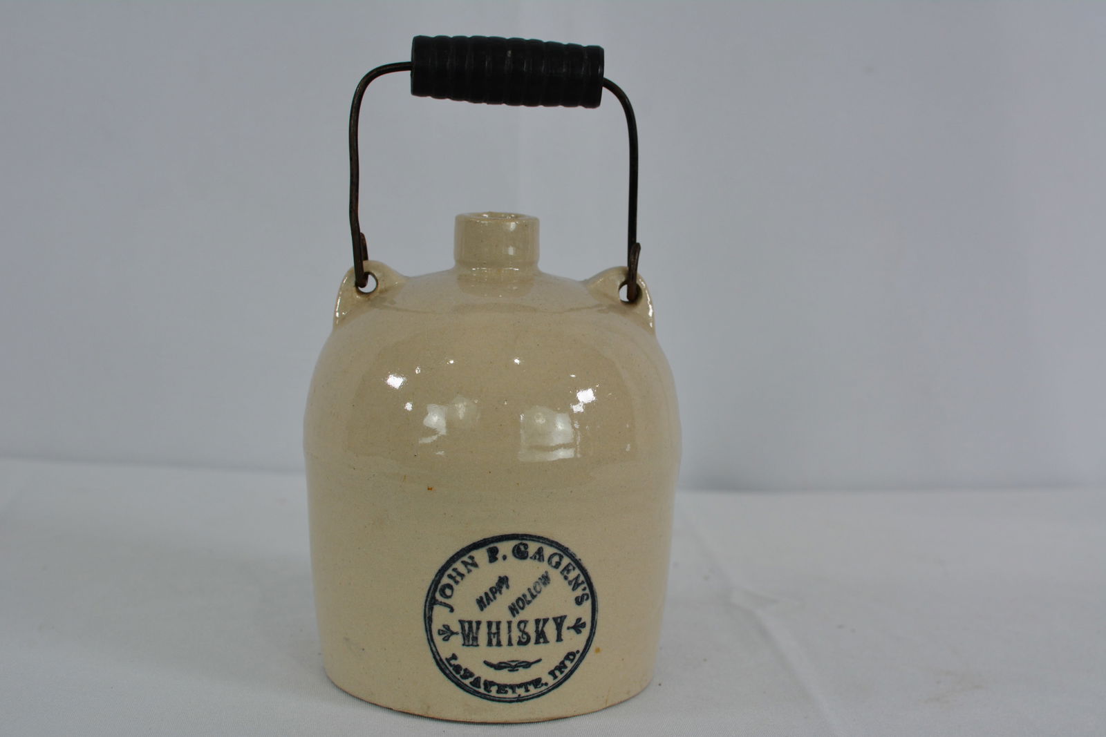 John P. Gagen's Happy Hollow Whisky Jug Lafayette Indiana w/ wire bail & ribbed wood handle. (1 of 4)
