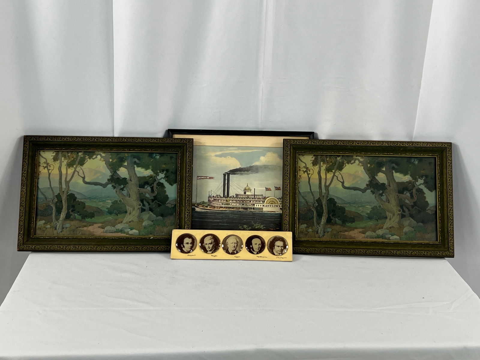 3 Framed Prints: 3 Framed Prints, Courier print of the Steamboat Mayflower, 2 "The Oaks" Volchrome prints, 5 composer medallions