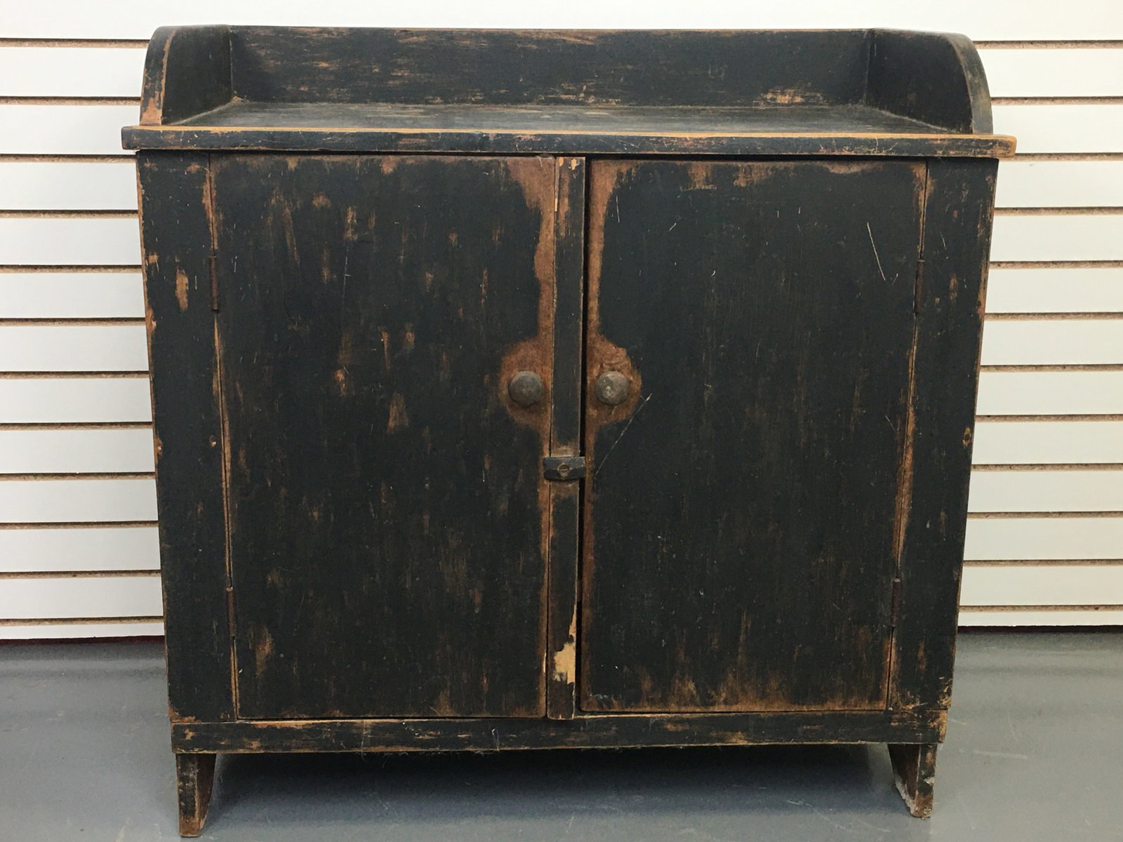 Two Door Cupboard in Black Paint: Two Door Cupboard in Black Paint. With backsplash and one fixed shelf. Missing piece on back. 35.5"W x 19.25"D x 36"H.