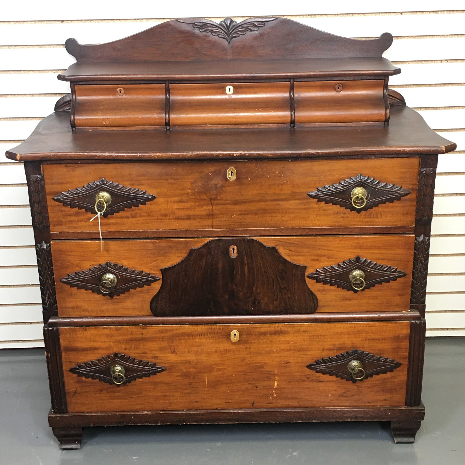 6 Drawer Chest: 6 Drawer Chest. 3 small over 3 large drawers. Carved panels at sides of drawers and around pulls. Inlaid keyholes, some missing. 45.5"W x 22"D x 47"H