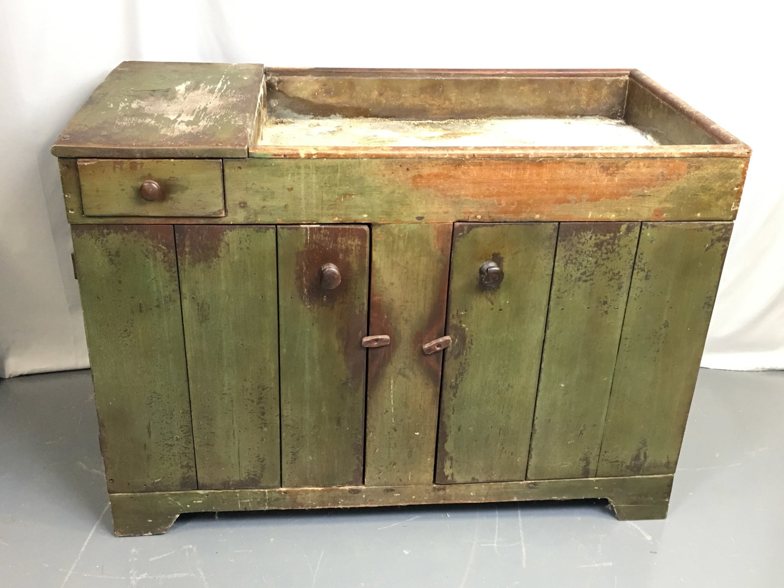 Painted Dry Sink: Painted Dry Sink. Zinc lined with top drawer over two doors, in old green paint. 45.25" W x 23"D x 32.5"H.