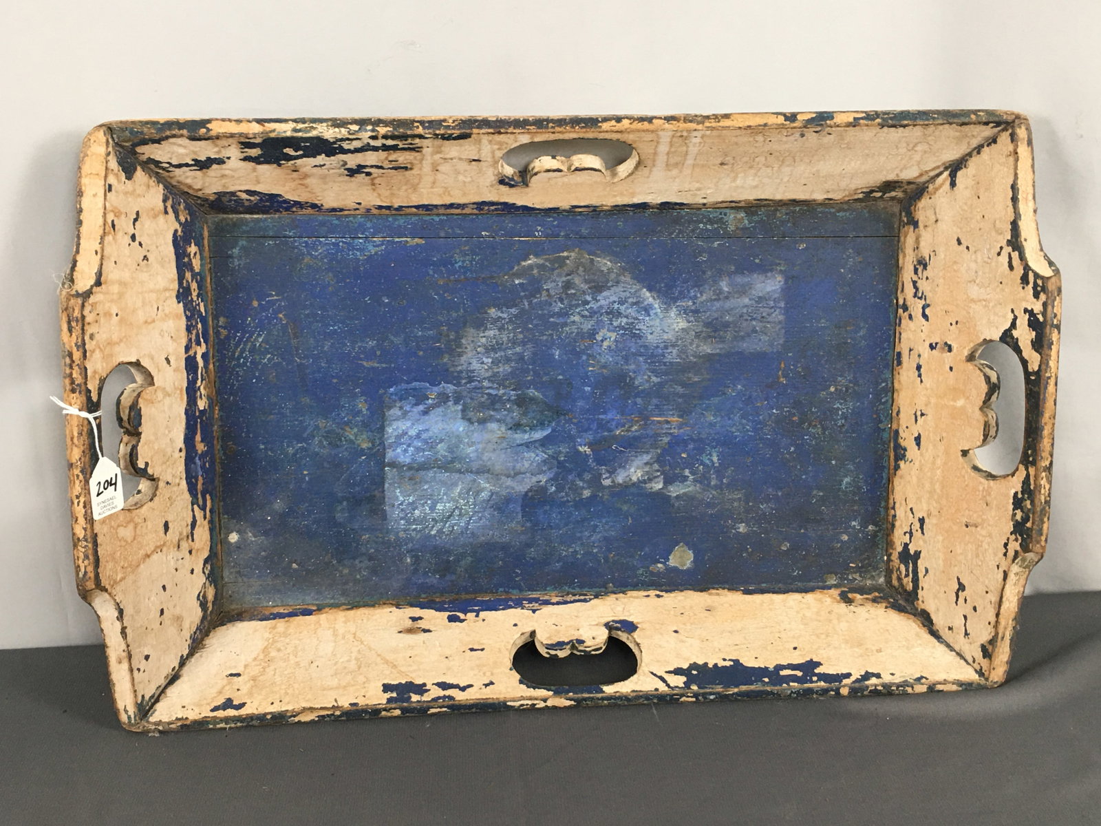 Wooden Tray in Blue Paint: Wooden Tray in Blue Paint, with cut out handles. 25"L x 15.5"W x 3"H.