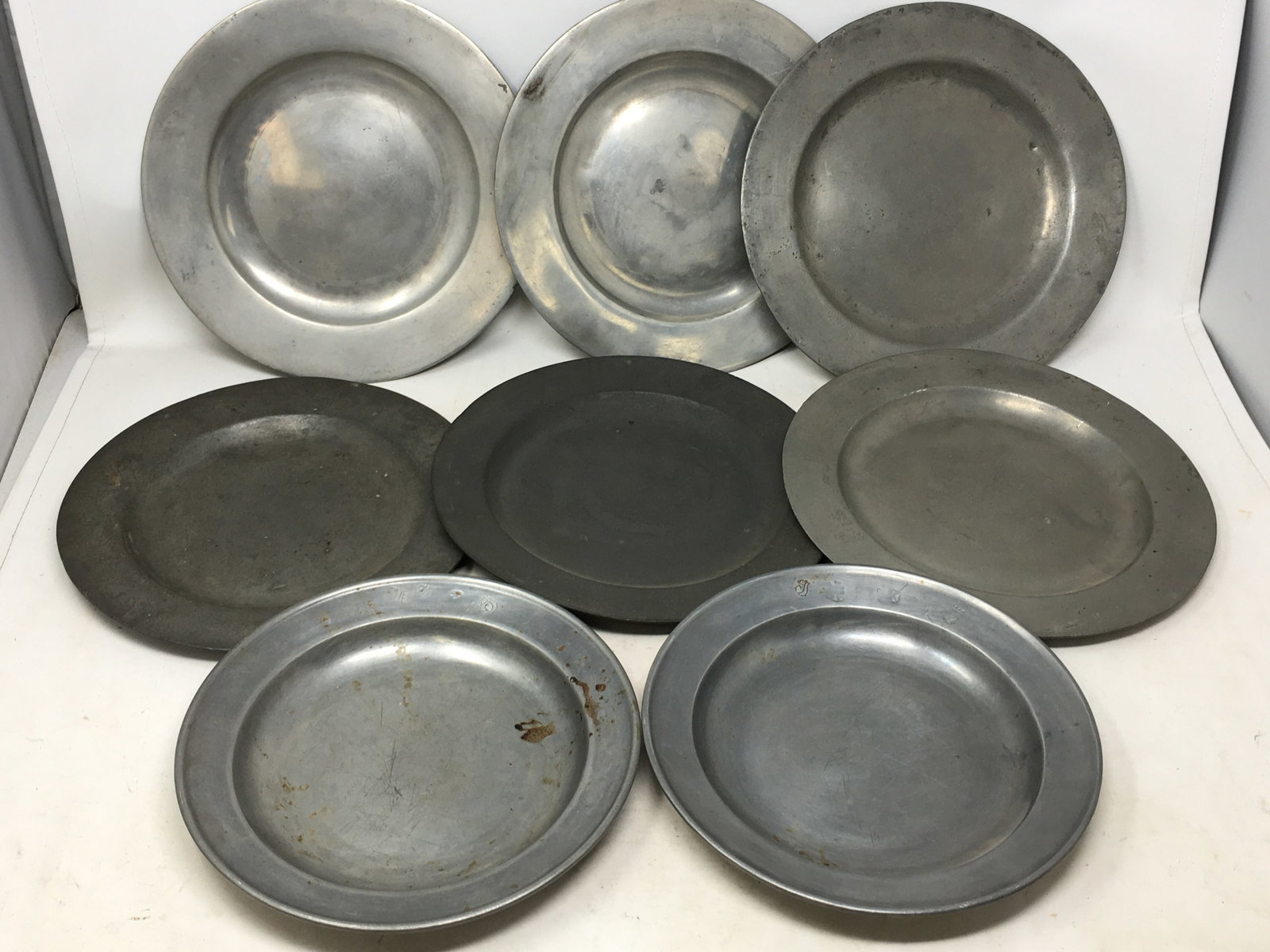 Group of (8) Antique Pewter Plates/Chargers: Group of (8) Antique Pewter Plates/Chargers. Approx 8.5"-9.5"D