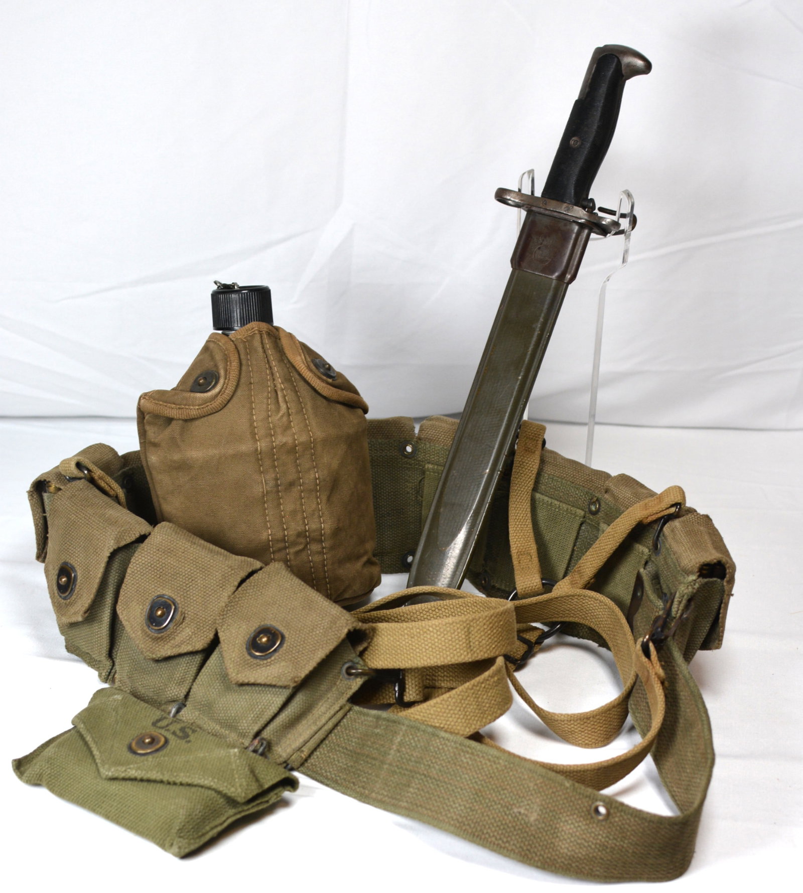 WWII U.S. PAL M1 Garand Bayonet with M1910 Web Gear & Canteen Set: Original World War II U.S. M1 Garand bayonet manufactured by PAL Blade & Tool Co., marked "PAL" above the U.S. flaming bomb ordnance stamp on the ricasso. 14 inches with a blade length of approximatel