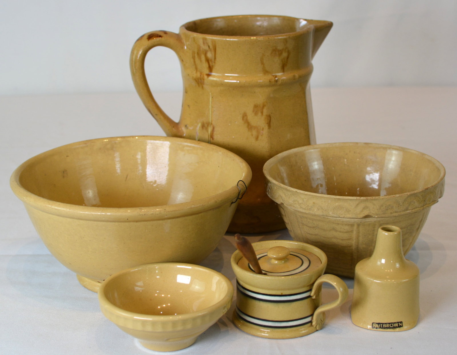 Collection of Yellowware Pottery Kitchen Articles and Stoneware Pitcher (1 of 2)
