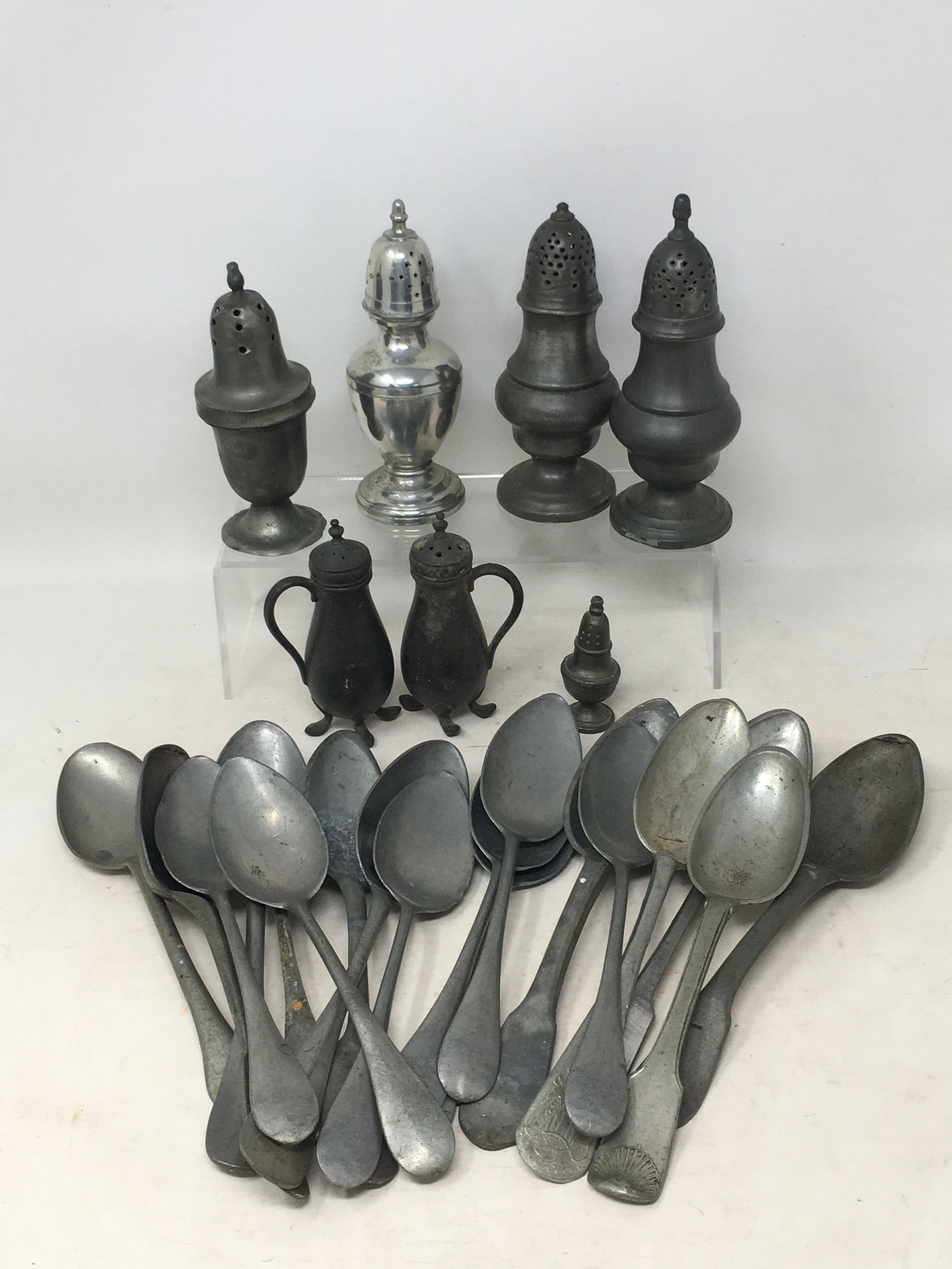 Group of Pewter Items: Group of Pewter Items. Incl. 18 spoons, 7 salt & pepper shakers. Tallest 5.5"H