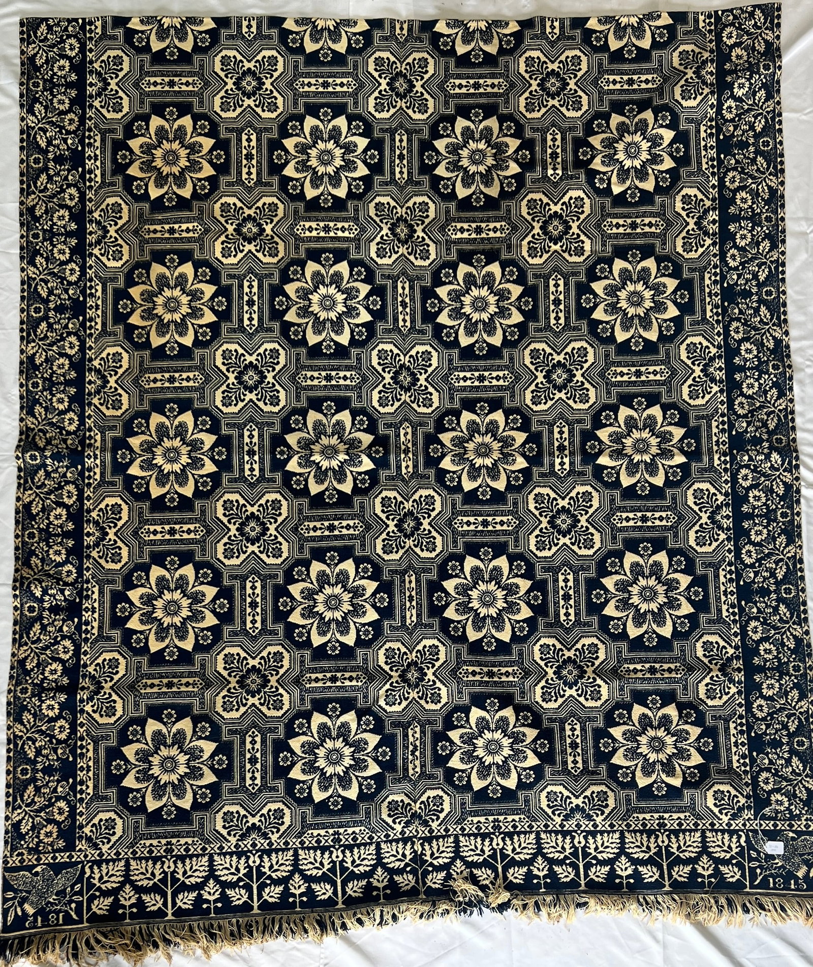 1845 Indigo and Natural Cotton Samuel Graham, Henry County, IN Coverlet: 1845 Indigo and Natural Cotton Samuel Graham, of New Castle, Henry County, IN Coverlet, dated corner block with bird on a branch, 75" X 86" needs cleaned