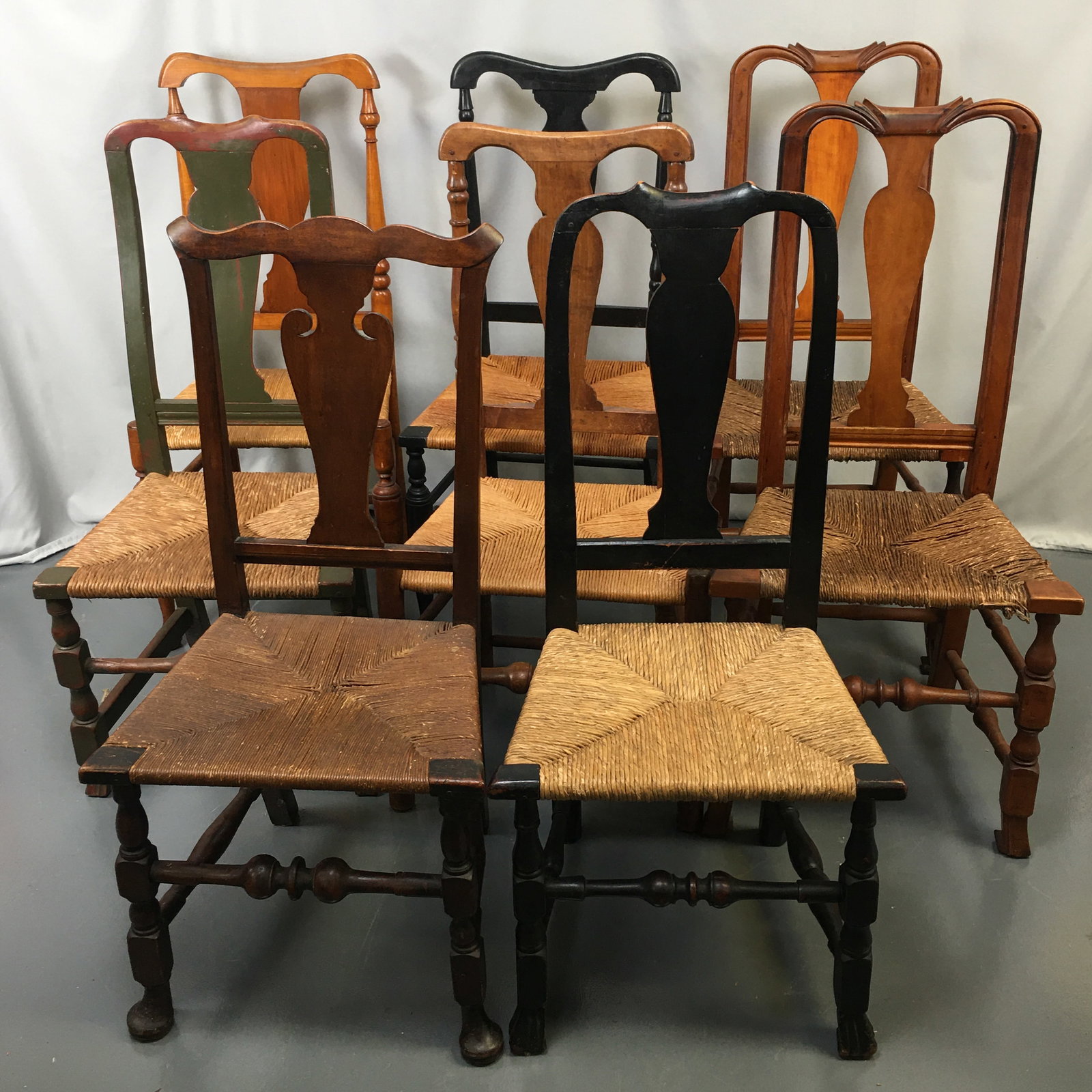 (8) Rush Bottom Chairs: Group of (8) Rush Bottom Chairs. Some loose caning on seats. Approx 40"H.