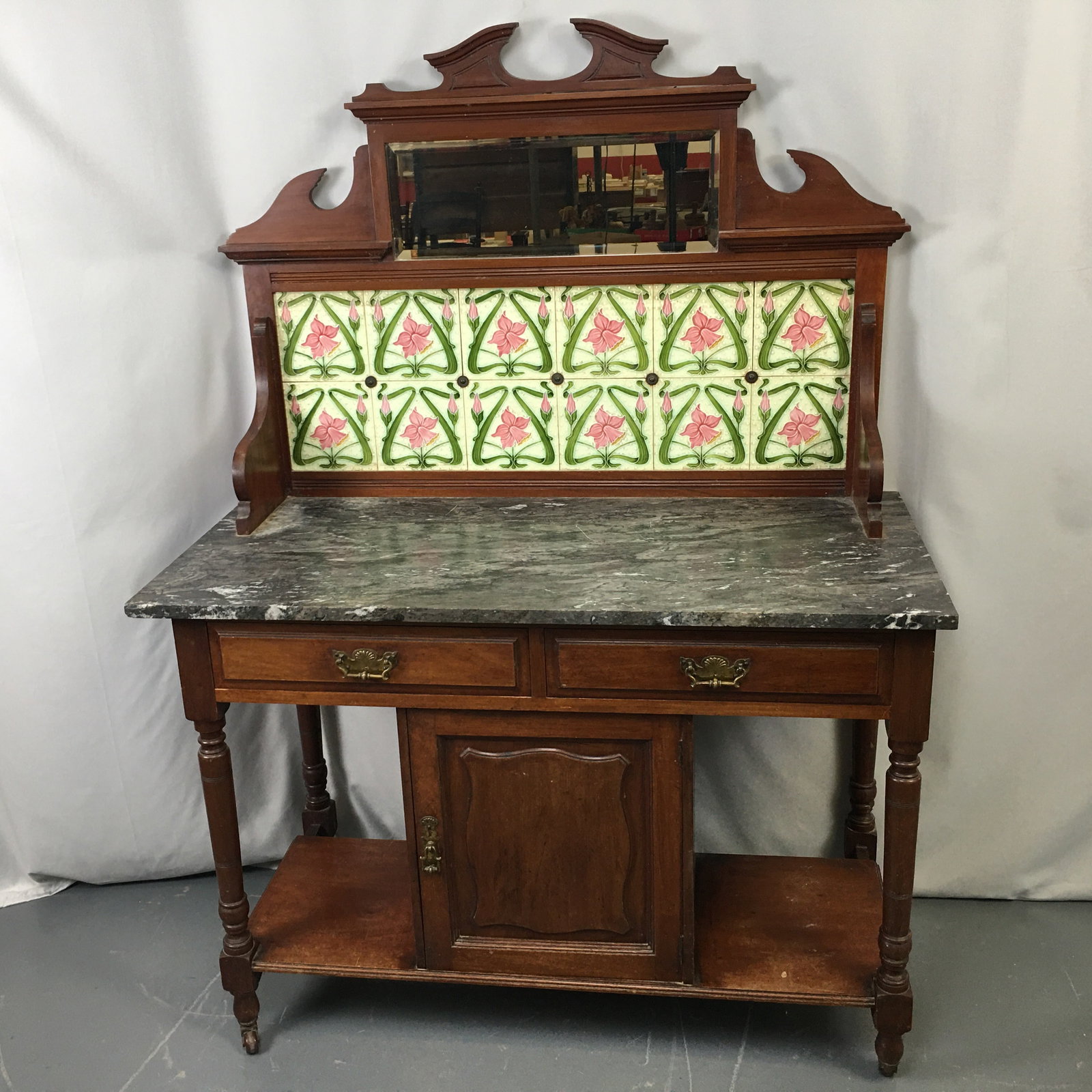 Cherry Marble Top Server, Tile & Mirror Back: Cherry Marble Top Server. Pink/green daffodil tiles & mirror back. Two drawers over one door, on casters. 42.5"W x 20"D x 58.25"H
