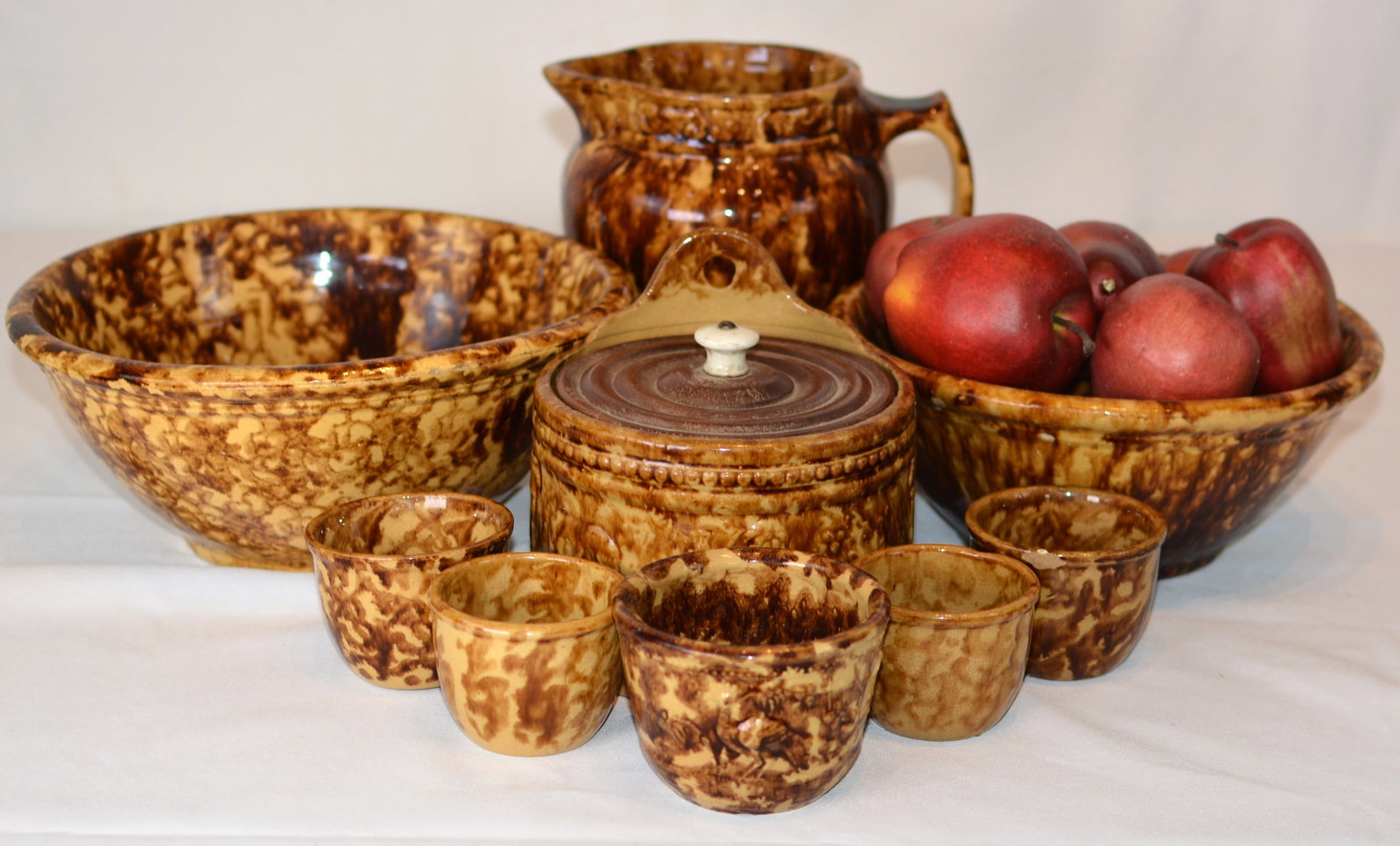 Group of Bennington/Rockingham-style spongeware and mottled brown-glazed pottery (1 of 5)