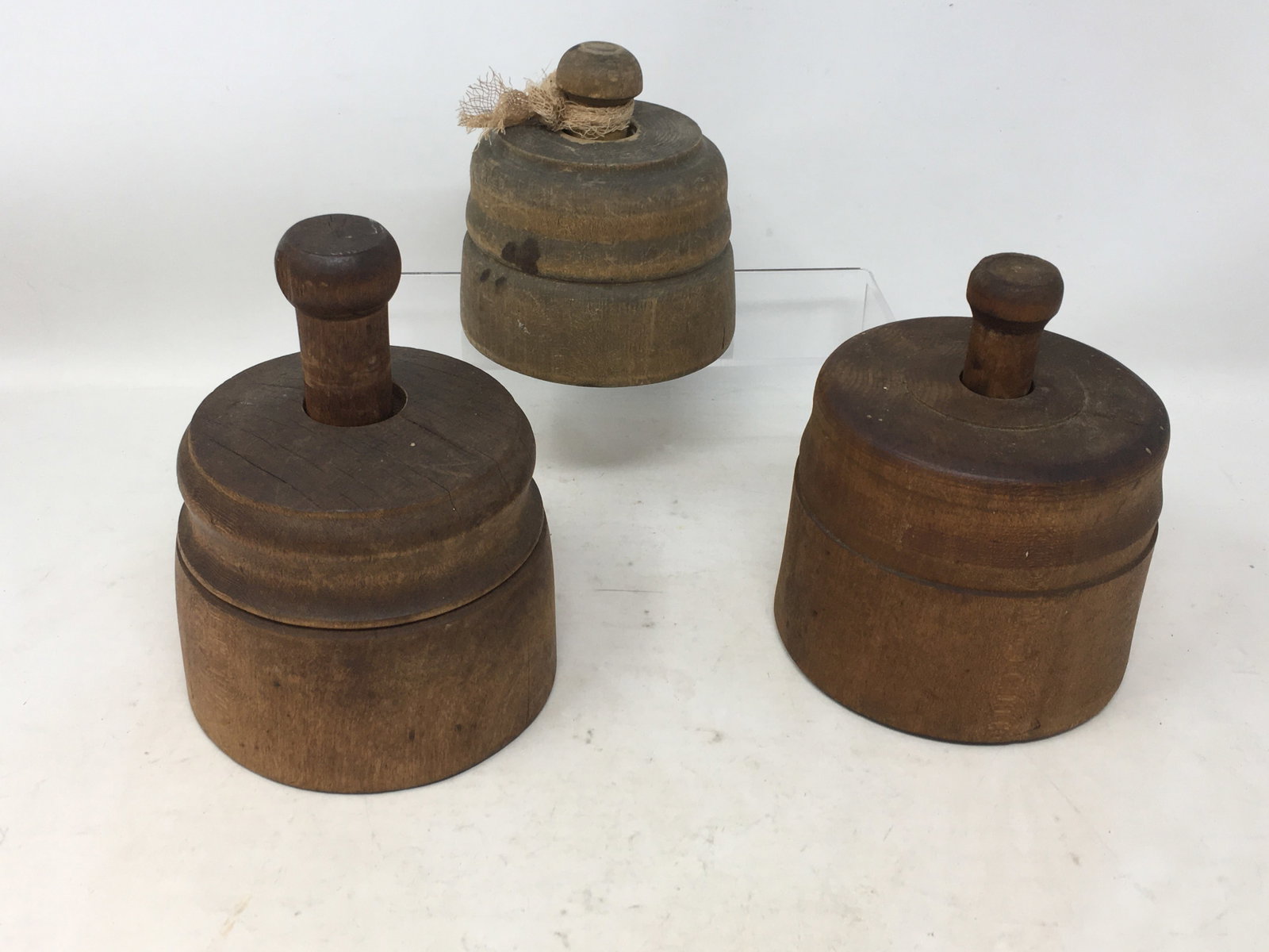 (3) Wooden Butter Molds: (3) Wooden Butter Molds. One with a sheaf of wheat, 2 floral. Tallest 6"H.