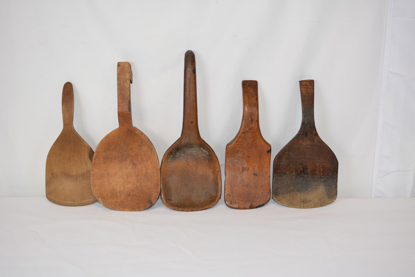 Collection of Five Antique Hand-Carved Wooden Butter Workers (1 of 2)