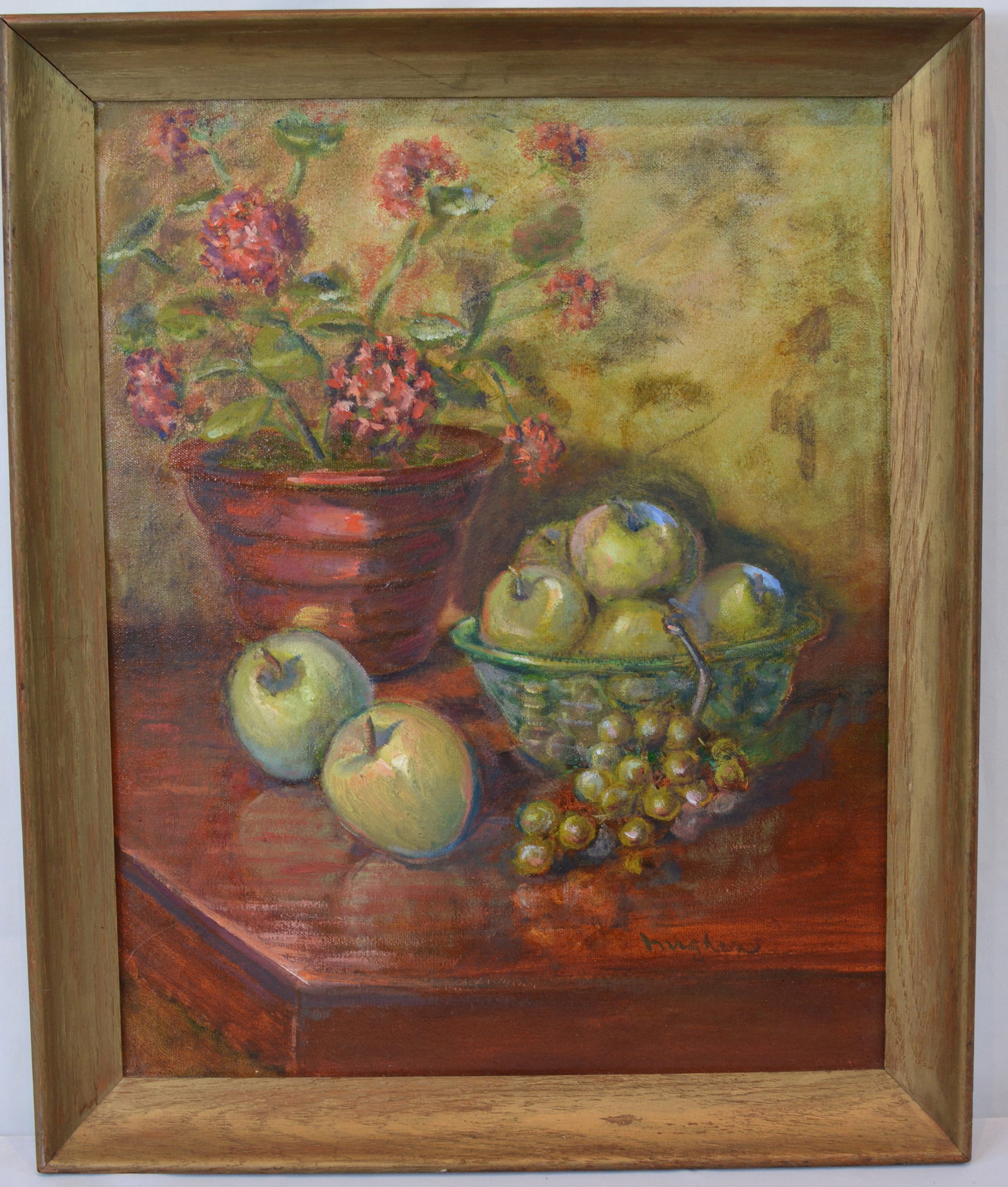 Signed Hughes Still Life Oil on Canvas with Apples, Grapes & Flowers: Original oil on canvas still life painting signed "Hughes" lower right. The composition depicts a tabletop arrangement featuring a terracotta flower pot with blooming pink blossoms alongside a basket