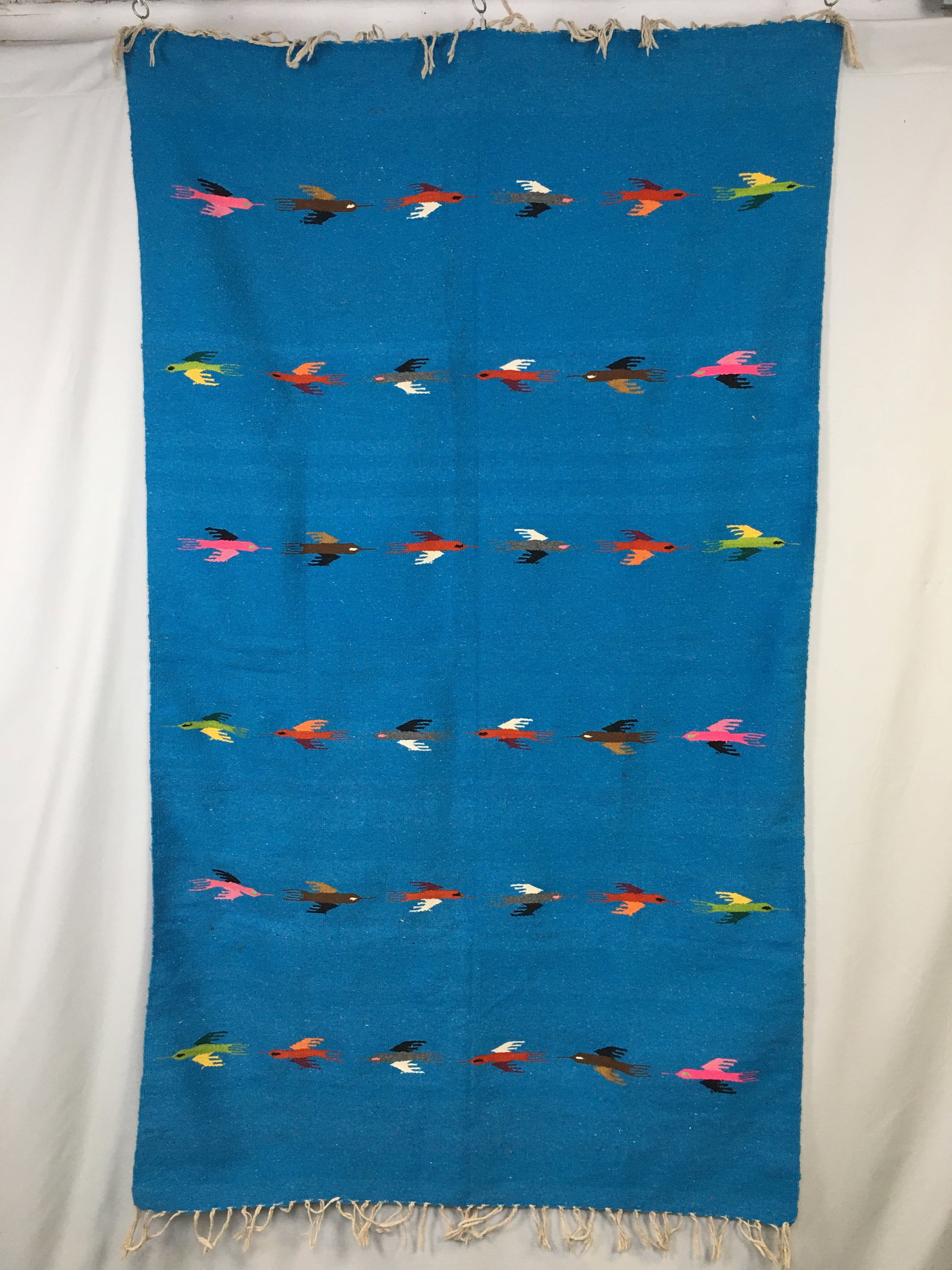 Southwestern Woven Thunderbird Blanket: Southwestern Woven Thunderbird Blanket, in aqua blue, with fringe. 48"x84" without fringe