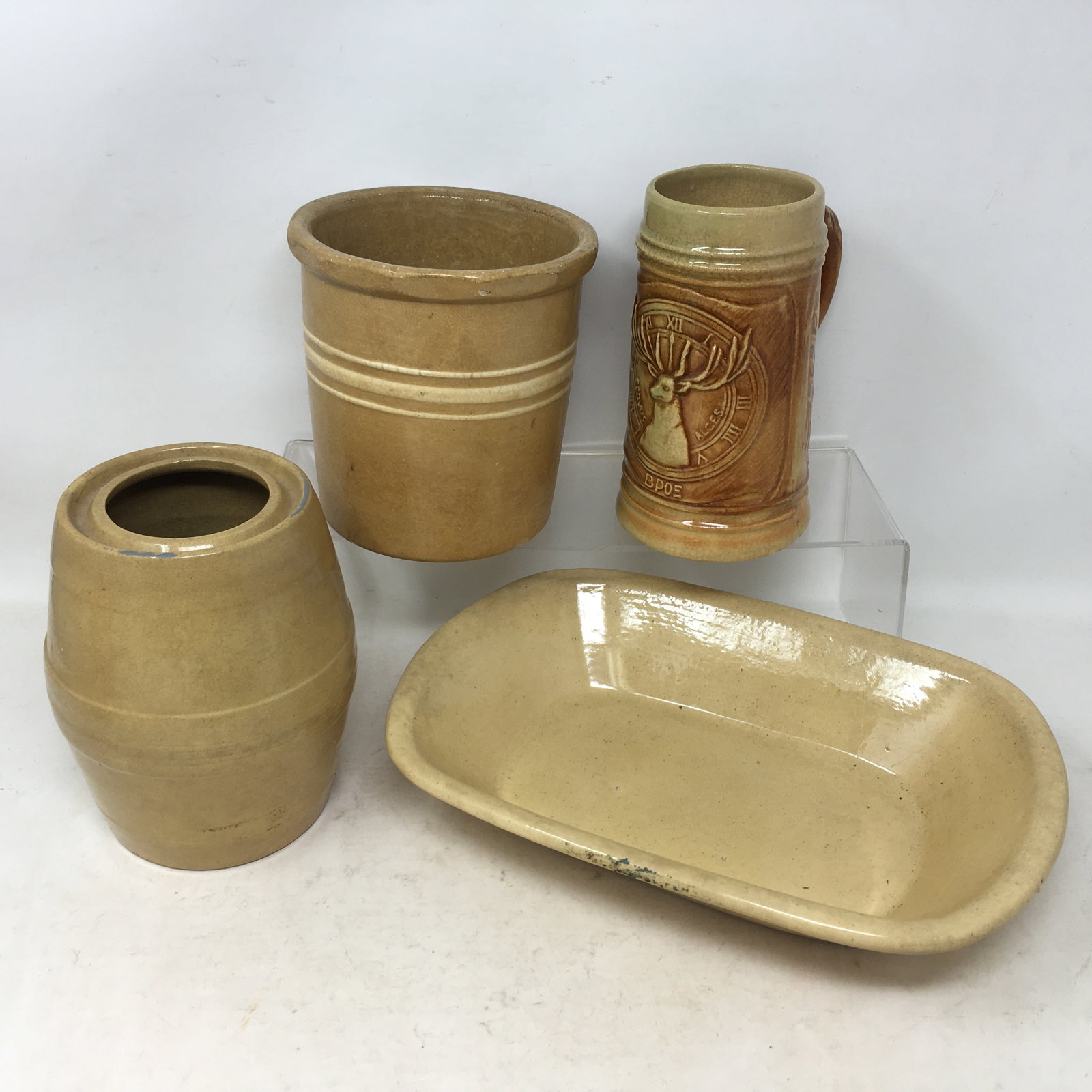 Group of Yellowware Items: Group of Yellowware Items. Incl. wax sealer jar, beater jar/utensil holder, dish & Hull BPOE stag mug. Mug is 6.25"H, dish is 11"x8".