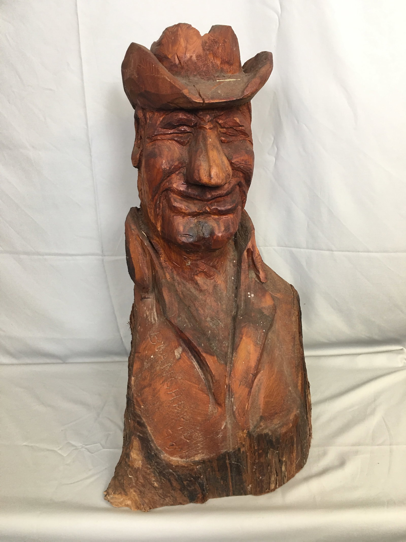 Folk Art Carved Cowboy by Blanchard: Folk Art Chainsaw Carved Cowboy by Blanchard.