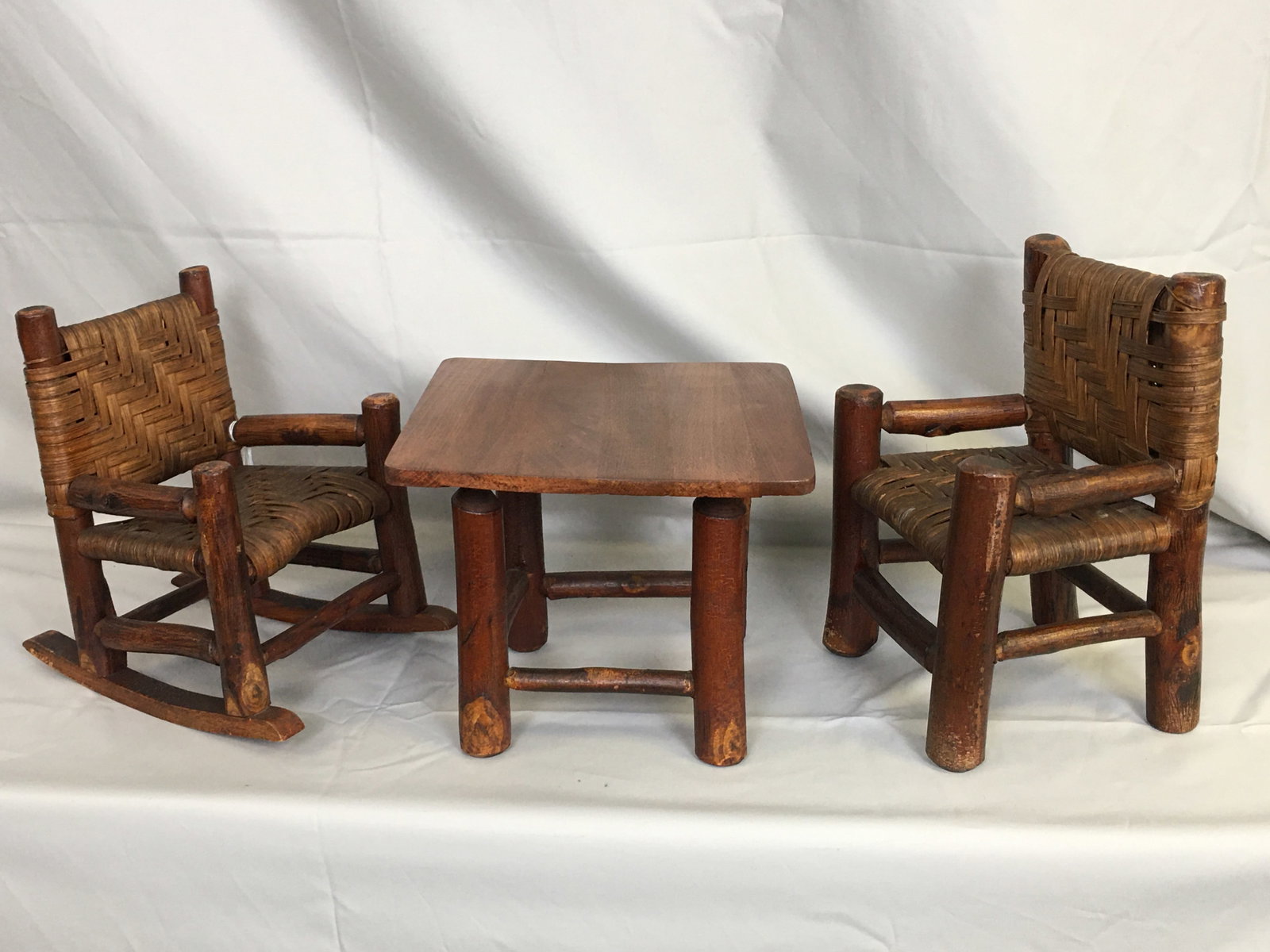 Doll Size Rustic Hickory Table & Chairs: Doll Size Rustic Hickory Table & Chairs. Chair and rocker, with woven seats/backs, and table. Tallest 12".