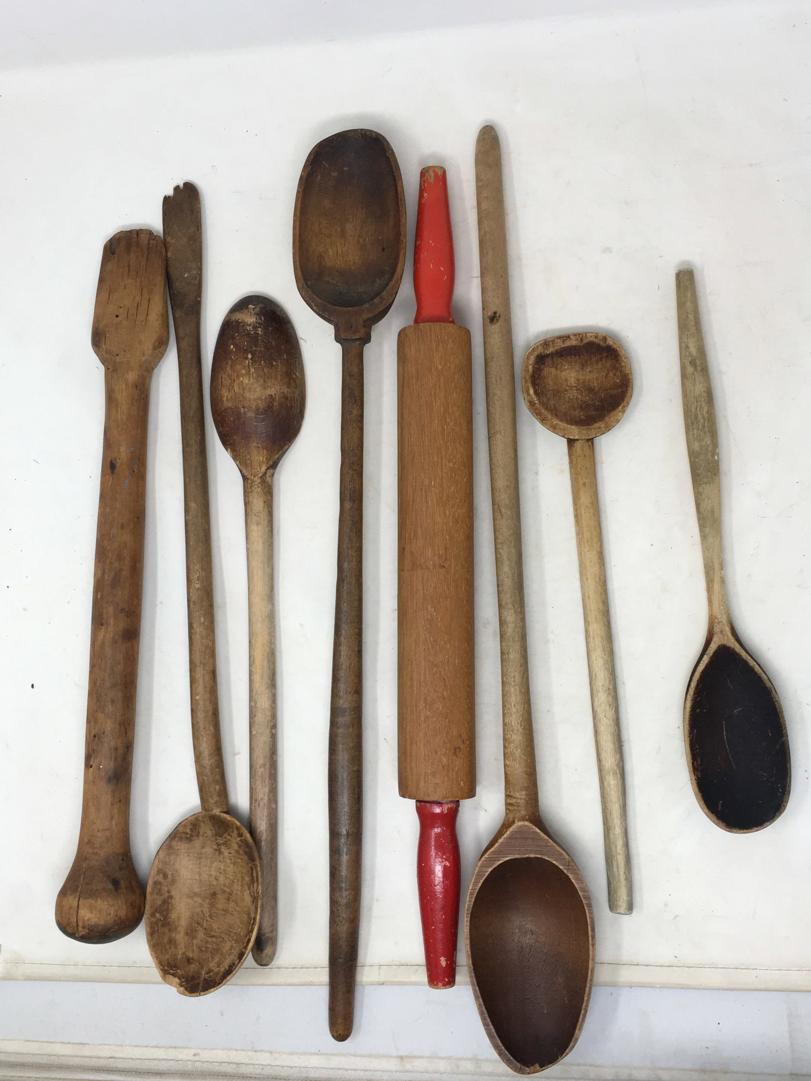 Group of Wooden Spoons & Rolling Pin: Group of 7 early wooden spoons & red-handled rolling pin. Longest 20"