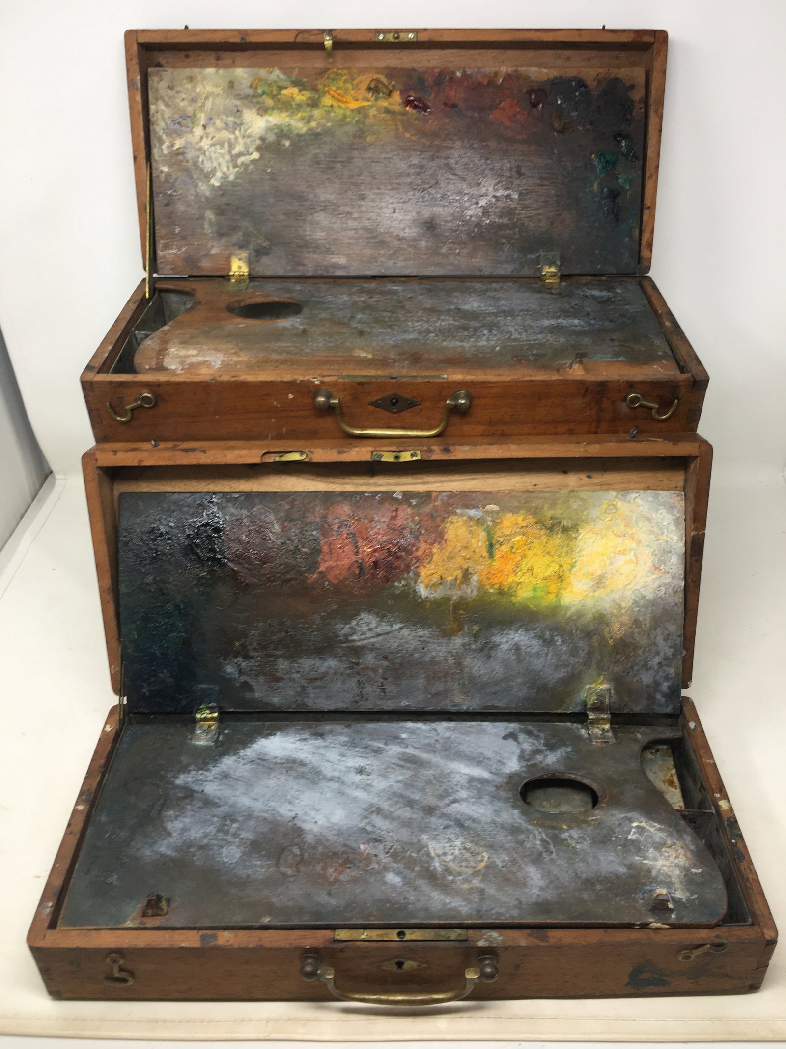Artist's Palette Boxes: (2) Artist's Palette Boxes, dovetailed cases. One box contains brushes and clip-on paint pots. 15.25"L x 6.75"D x 3.25"H.