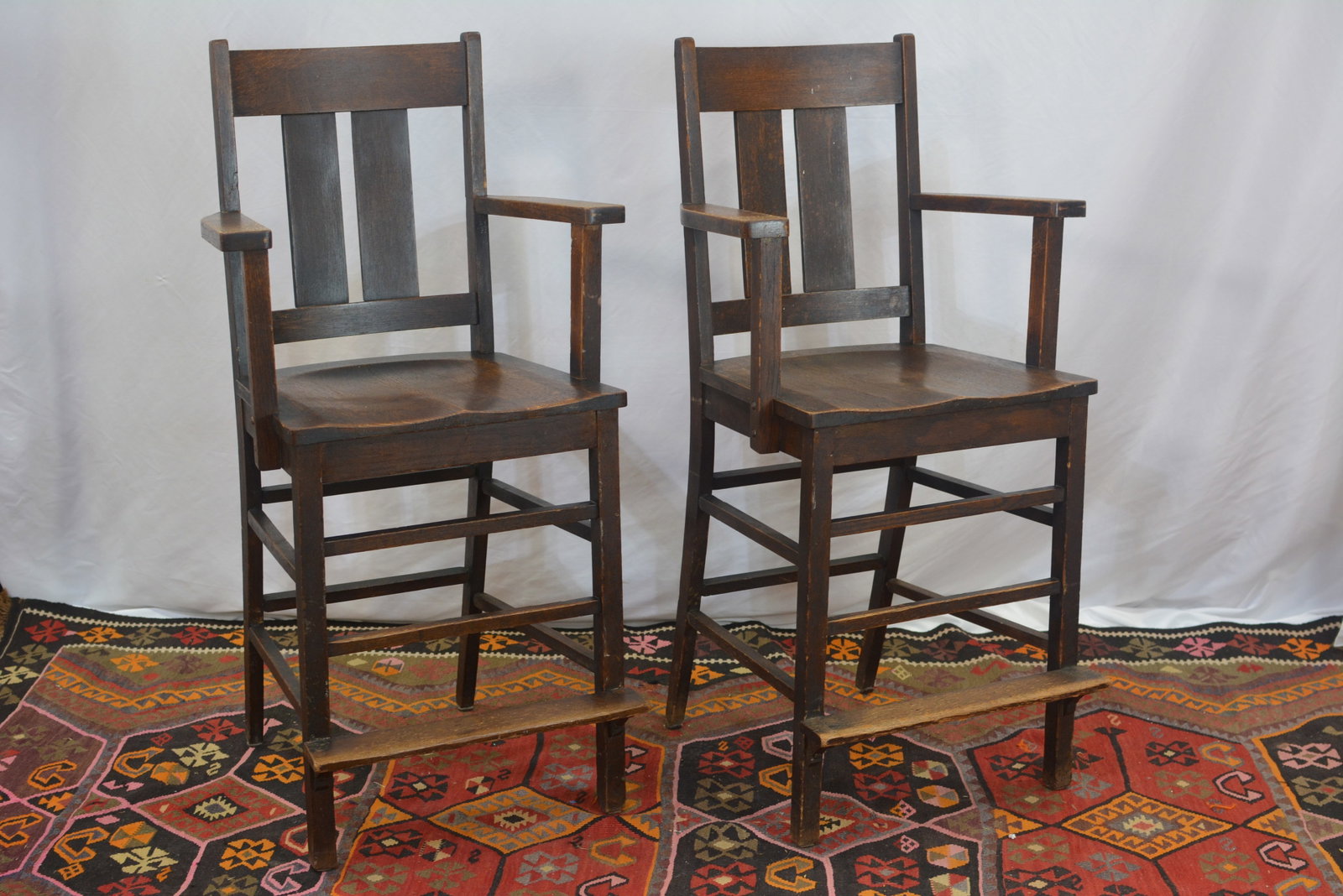 Pair of 1920's Crocker Chair Co. Billiard Room Chairs: Pair of 1920's Crocker Chair Co. Billiard Room Chairs, oak Arts and Crafts chairs made by the Crocker Chair Co. of Sheboygan, Wisconsin. One chair has remnants of the paper label. 46"H X 25"W X 24"D