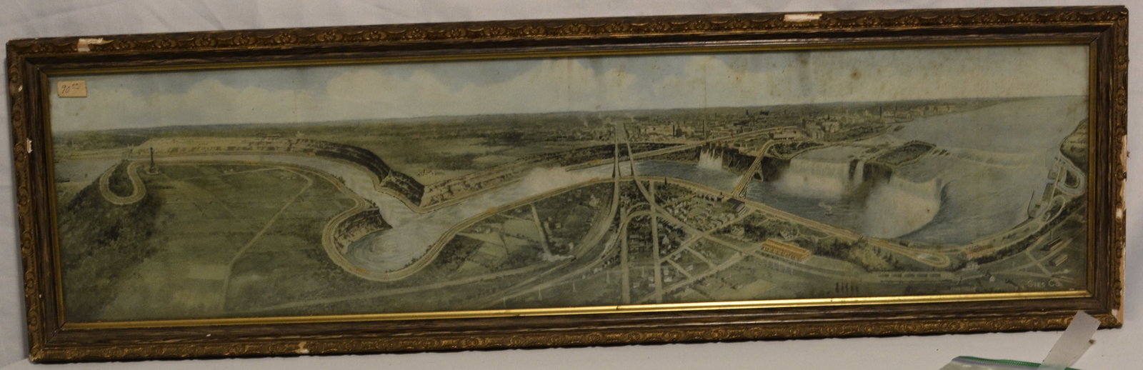 Niagara Falls Panoramic Bird's-Eye View & Souvenir: framed panoramic bird's-eye view of Niagara Falls depicting the American and Horseshoe Falls, Niagara River, surrounding landscape, rail lines, bridges, and early development of the area. The