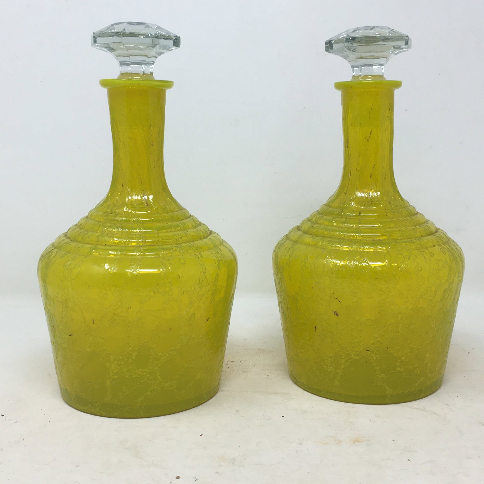 Pair of Yellow Crackle Glass Decanters: Pair of Yellow Crackle Glass Decanters. Vintage art glass decanters with clear stoppers. Unsigned. 9"H